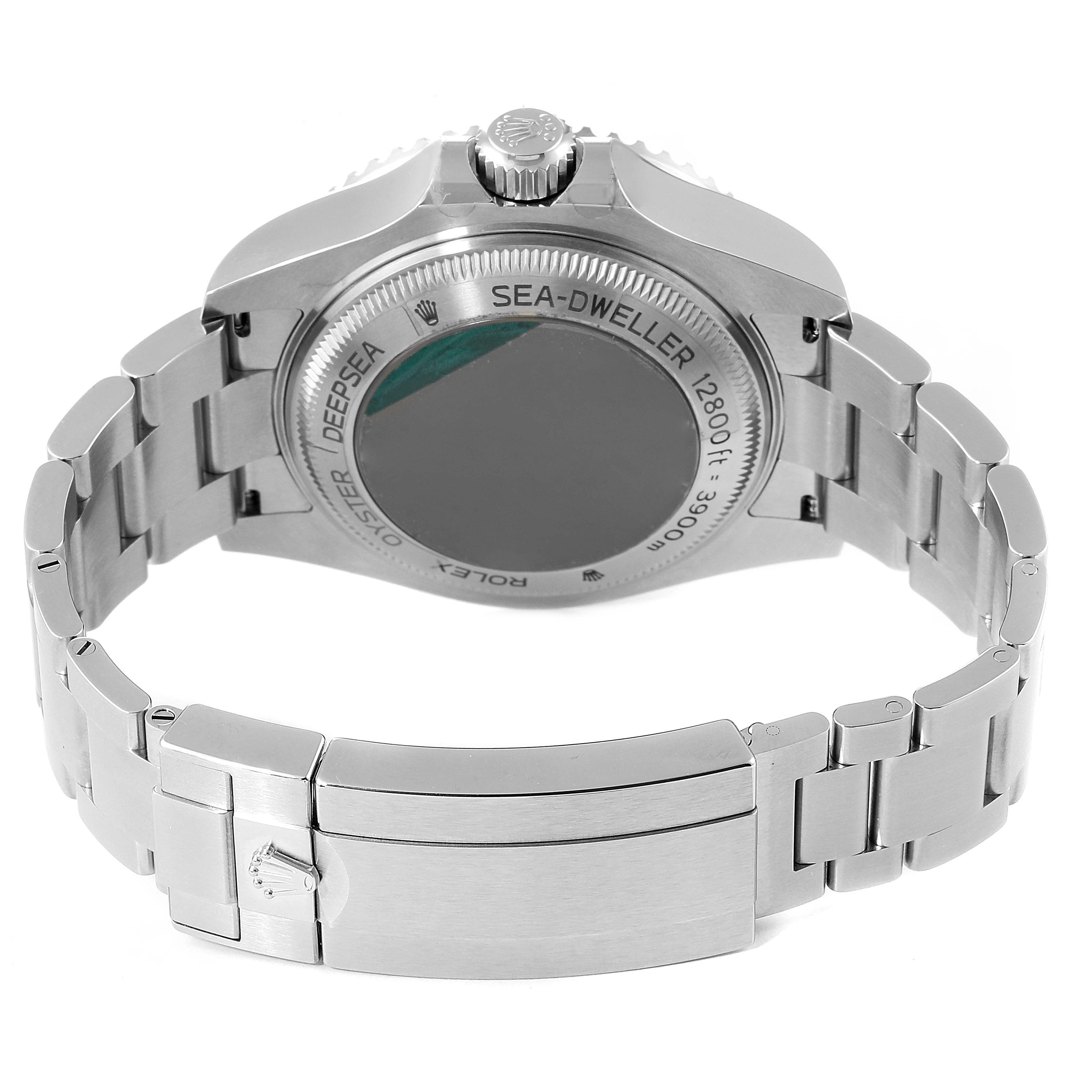 The image shows the back view of a Rolex Sea-Dweller 126660 Men
s Stainless Steel Blue Dial 126660 Men
s Stainless Steel Blue Dial watch, highlighting the case back and bracelet clasp.