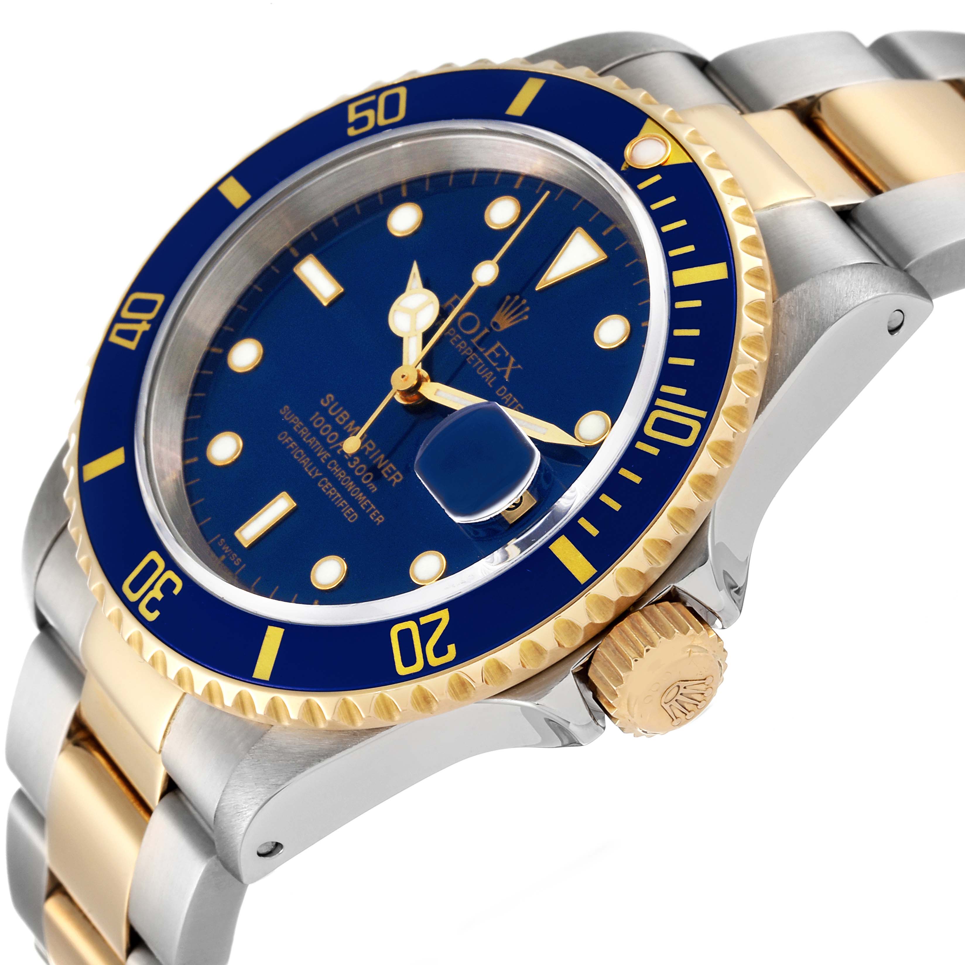This image shows a Rolex Submariner 16613 Men's Steel and Gold (two tone) Blue Dial 16613 Men's Steel and Gold (two tone) Blue Dial watch from an angled view, displaying the bezel, crown, bracelet, and dial.