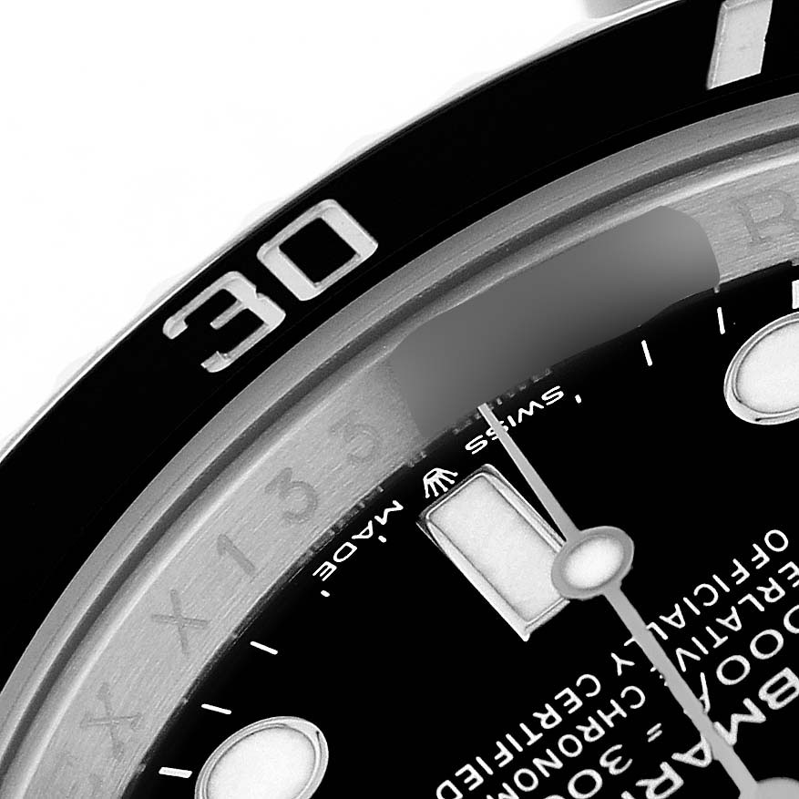 The image shows a close-up of the Rolex Submariner M124060-0001 Men's Stainless Steel Black Dial, focusing on part of the dial and the bezel with the number "30" visible.