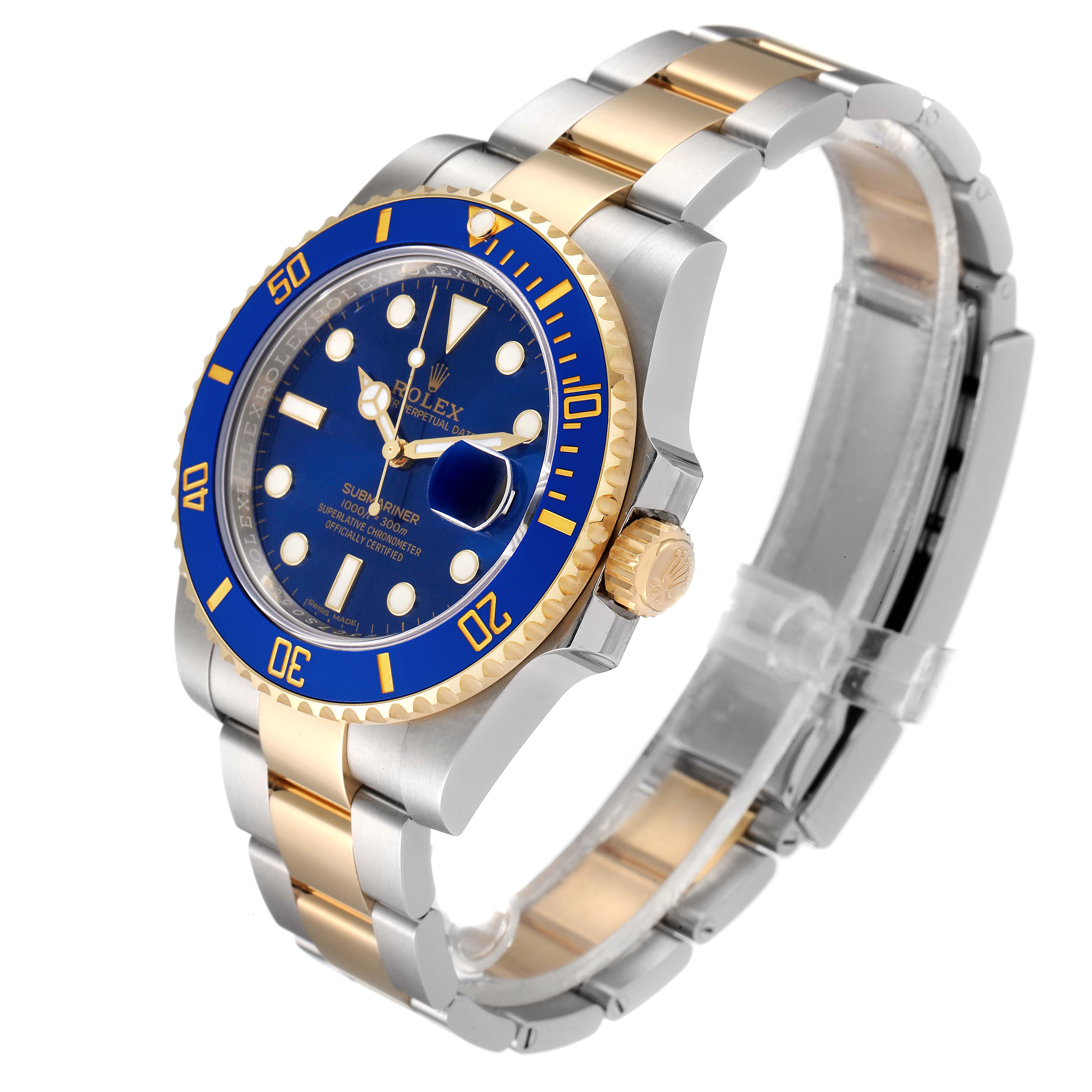 The Rolex Submariner 116613 Men
s Steel and Gold (two tone) Blue Dial 116613 Men
s Steel and Gold (two tone) Blue Dial watch is shown at a slight angle, featuring its blue and gold bezel, blue dial, gold crown, and two-tone bracelet.