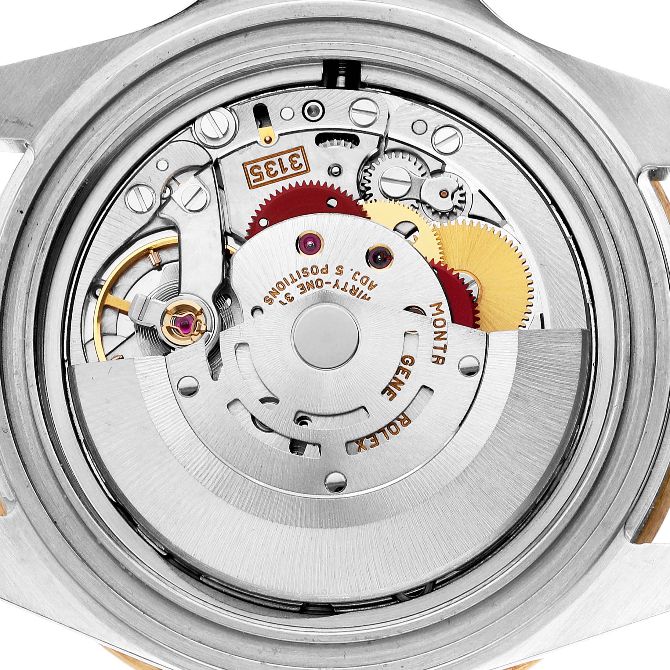The image shows the back view of the internal mechanism of a Rolex Submariner 16613 Men
s Steel and Gold (two tone) Champagne Dial 16613 Men
s Steel and Gold (two tone) Champagne Dial watch.