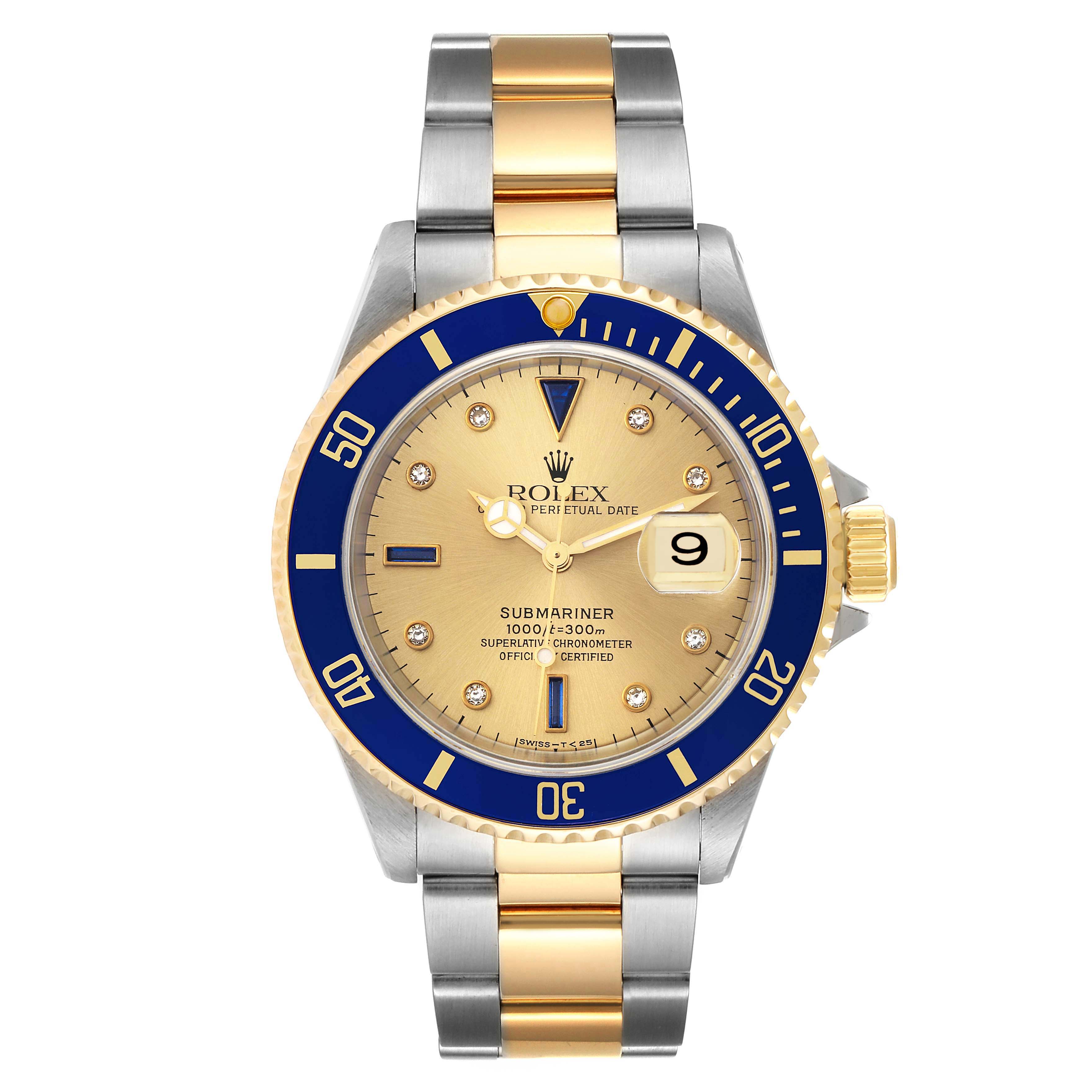 This is a front view of a Rolex Submariner 16613 Men
s Steel and Gold (two tone) Champagne Dial 16613 Men
s Steel and Gold (two tone) Champagne Dial watch, showcasing its gold and blue dial, bezel, and two-tone bracelet.