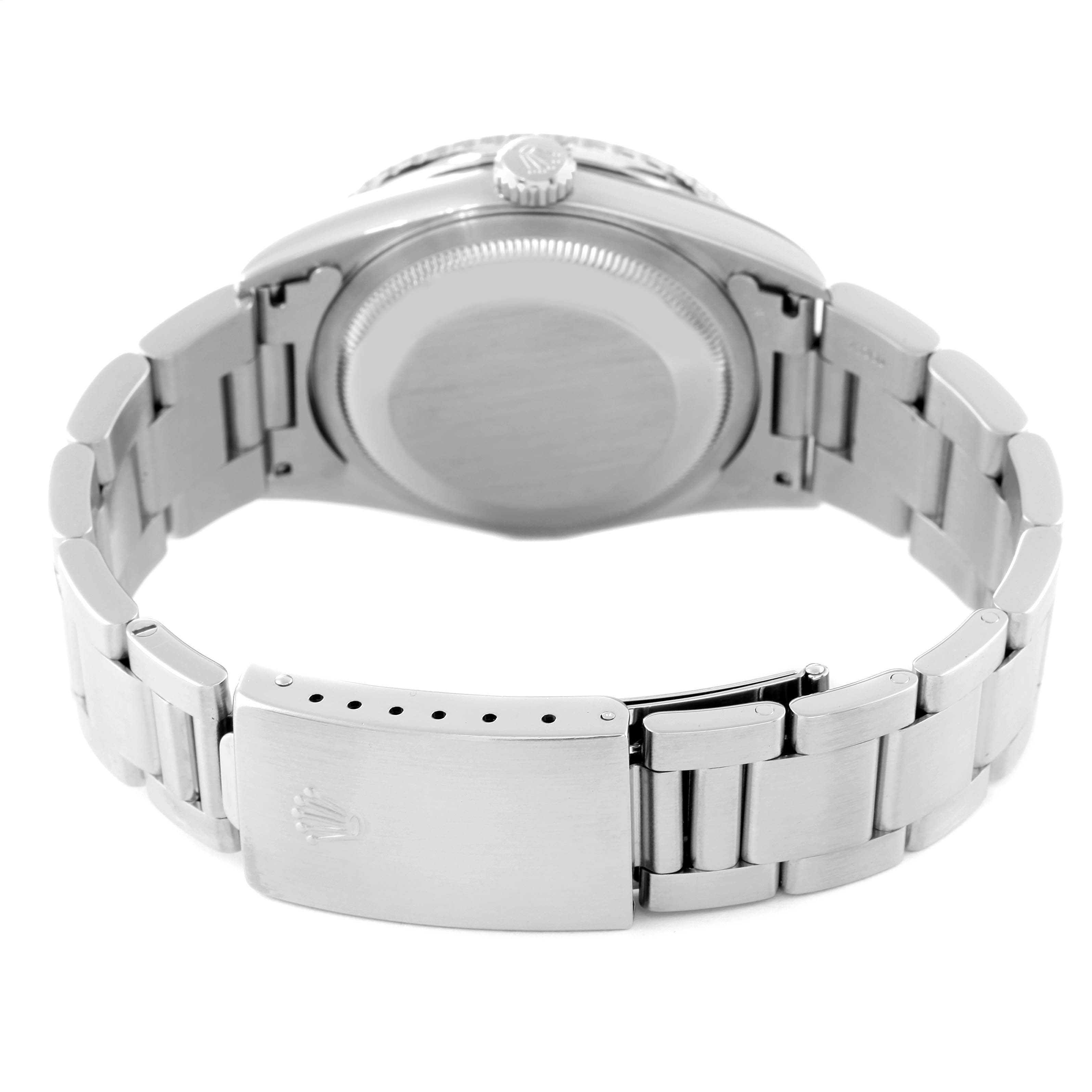 This image shows the backside of a Rolex Turn-o-Graph 16264 Men
s Stainless Steel Blue Dial 16264 Men
s Stainless Steel Blue Dial watch, focusing on the case back and metal bracelet clasp.