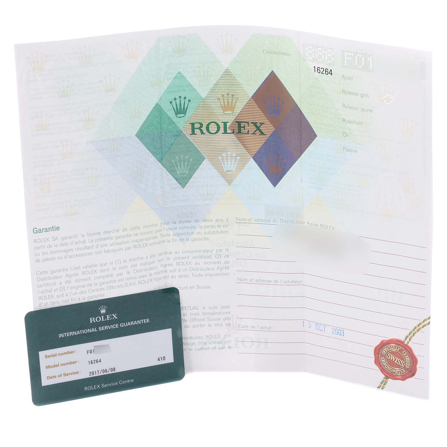 The image shows a guarantee and an international service guarantee card for a Rolex Turn-o-Graph 16264 Men
s Stainless Steel Blue Dial 16264 Men
s Stainless Steel Blue Dial watch.