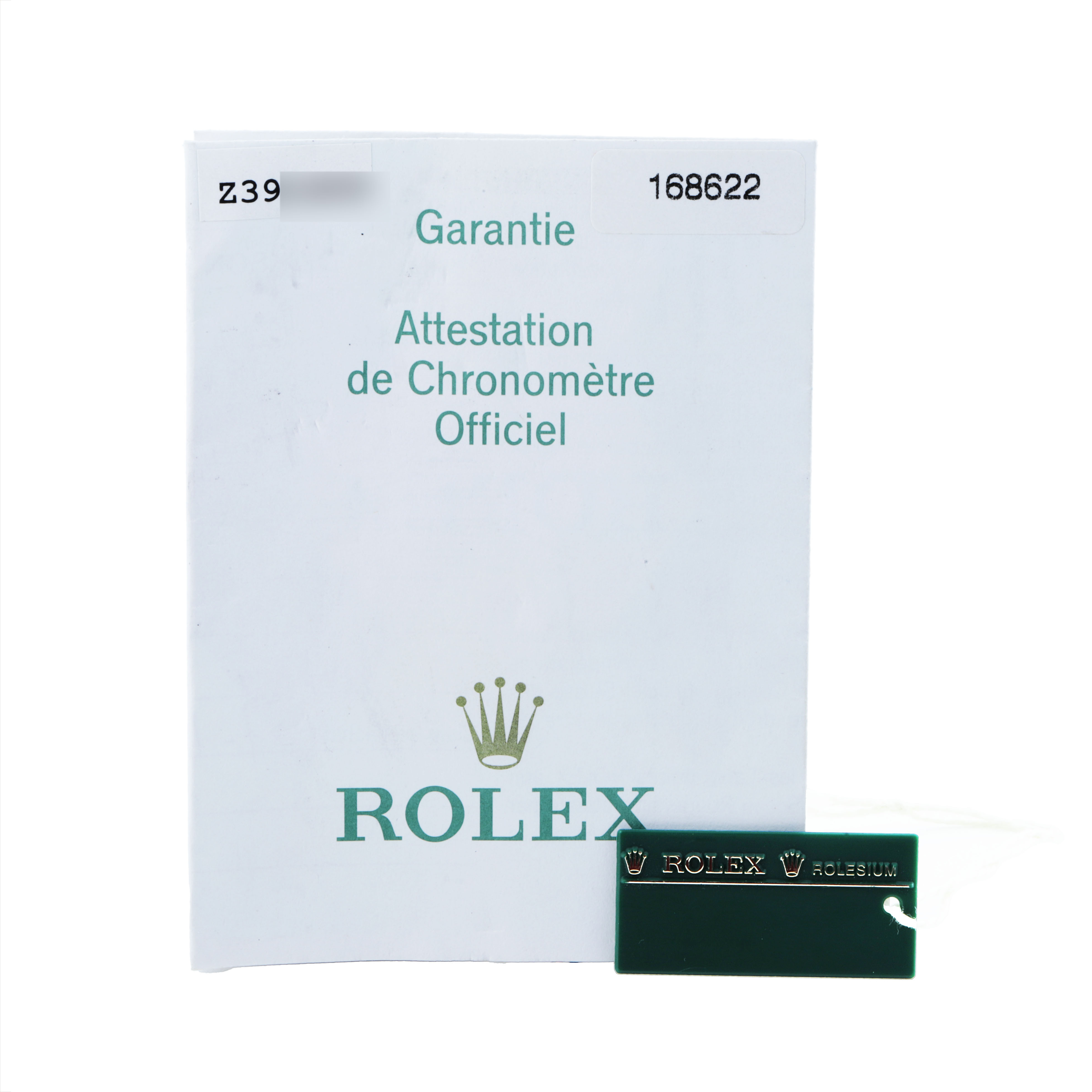 The image shows the official chronometer certification and a green tag for the Rolex Yacht-Master 168622 Men's Stainless Steel Silver Dial model.