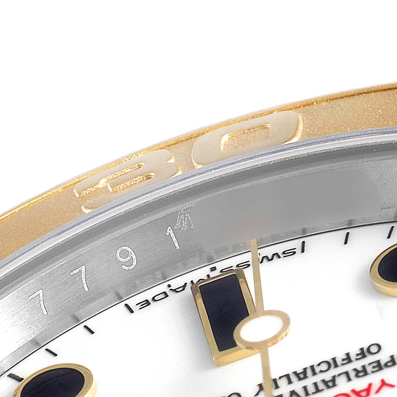 This close-up image shows part of the dial and bezel of the Rolex Yacht-Master 16623 Men's Stainless Steel White Dial 16623 Men's Stainless Steel White Dial watch, including numerals and hour markers.