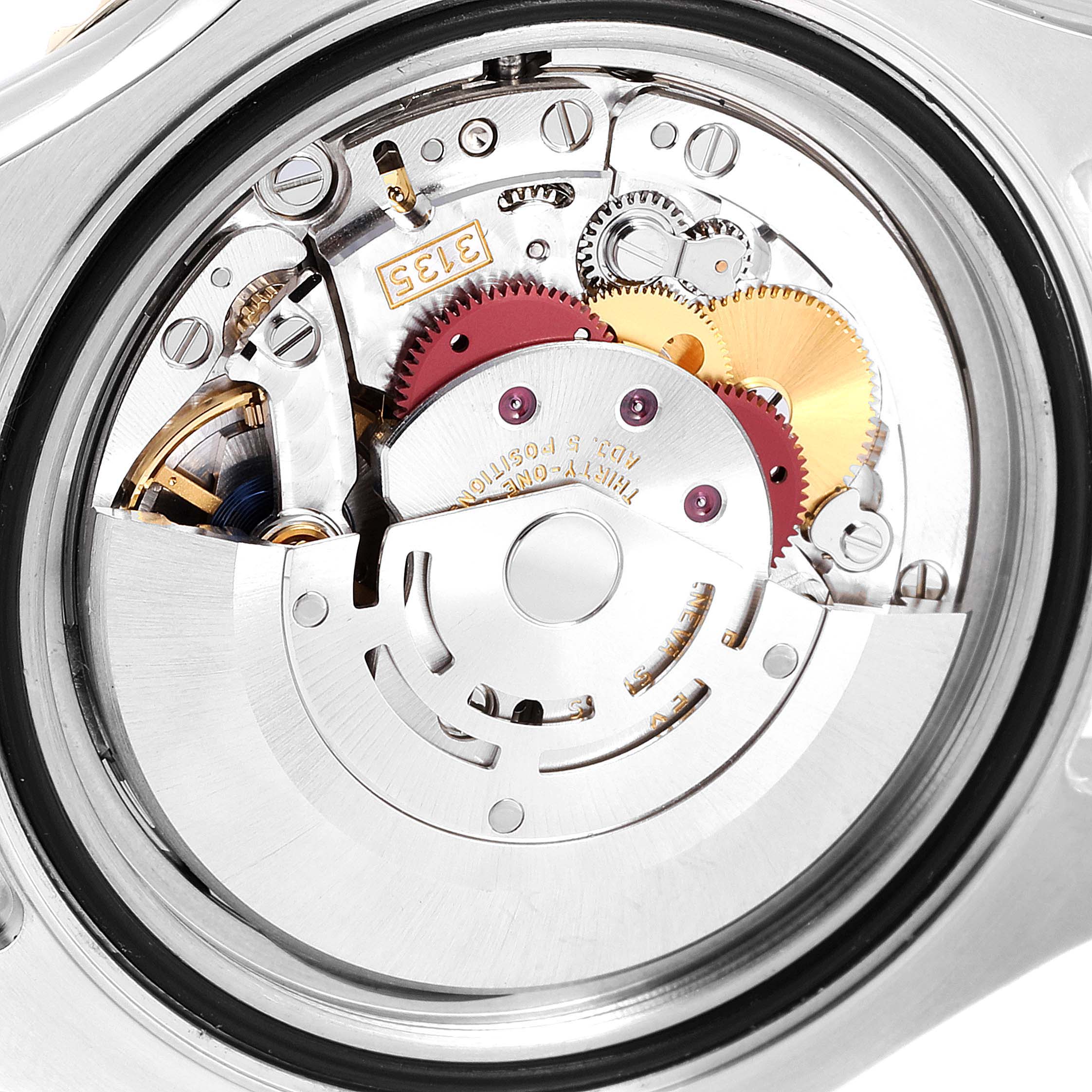 This image shows a close-up view of the internal mechanics of a Rolex Yacht-Master 16623 Men's Stainless Steel White Dial 16623 Men's Stainless Steel White Dial watch.
