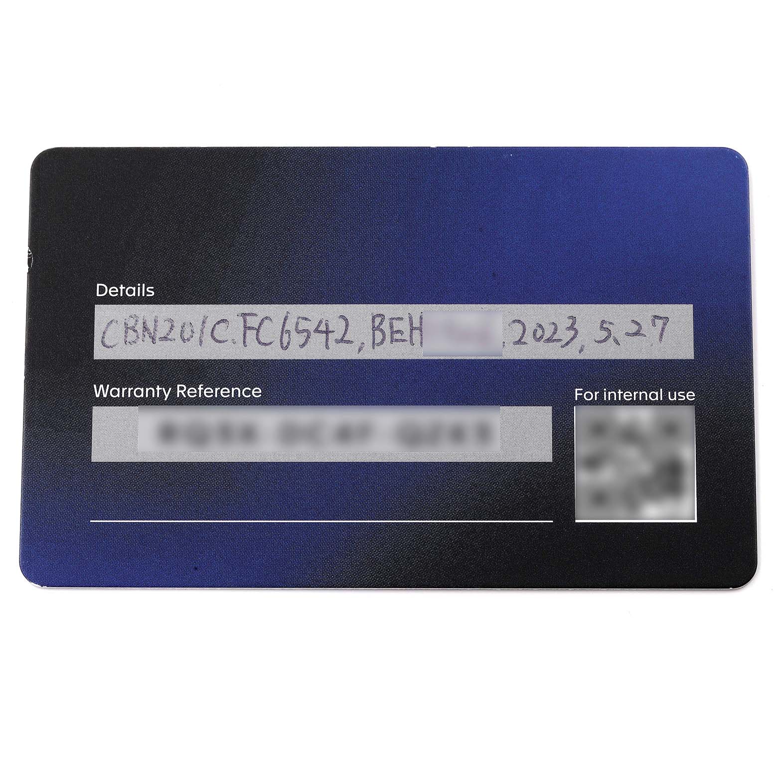 This image shows the warranty card for a Tag Heuer Carrera CBN201C.FC6542 Men's Stainless Steel Black Dial CBN201C.FC6542 Men's Stainless Steel Black Dial model, displaying details and warranty reference information.