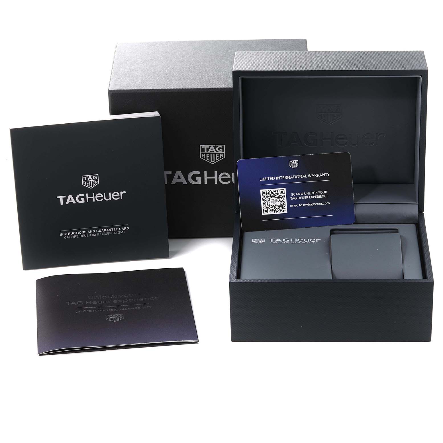 The image shows the packaging, manuals, and warranty card for a Tag Heuer Carrera CBN201C.FC6542 Men's Stainless Steel Black Dial CBN201C.FC6542 Men's Stainless Steel Black Dial watch.