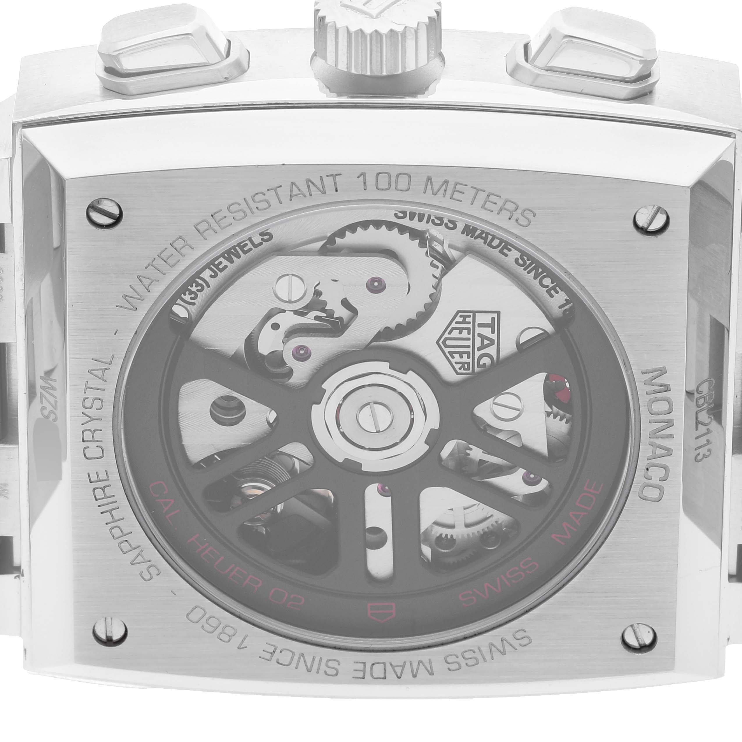 The image shows the back view of the Tag Heuer Monaco CBL2113.BA0644 Men's Stainless Steel Black Dial CBL2113.BA0644 Men's Stainless Steel Black Dial watch, displaying its movement and case details.