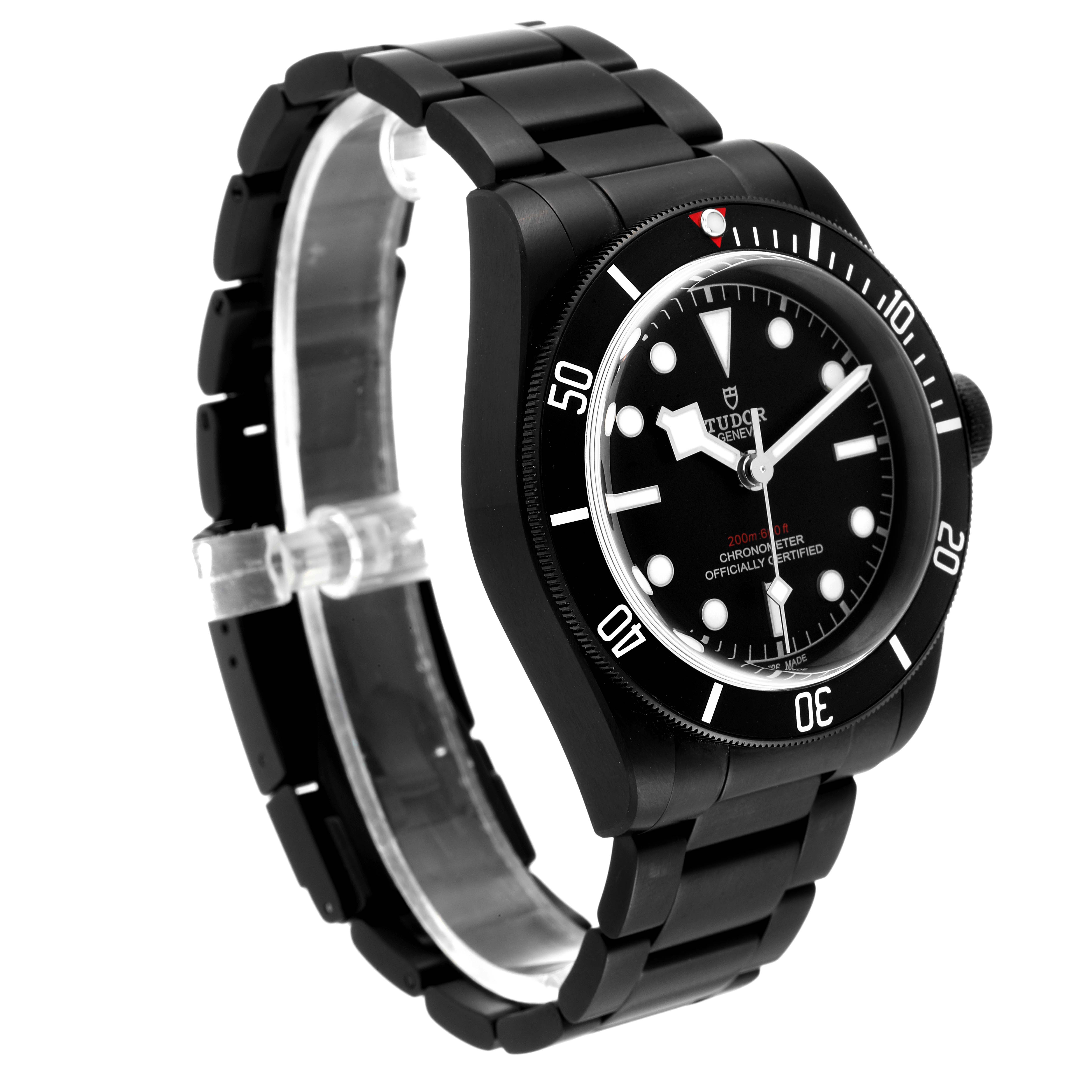 The image shows a Tudor Heritage Black Bay 79230DK Men's Stainless Steel Black Dial 79230DK Men's Stainless Steel Black Dial watch from a front-left angle, highlighting the black dial, bezel, and bracelet.