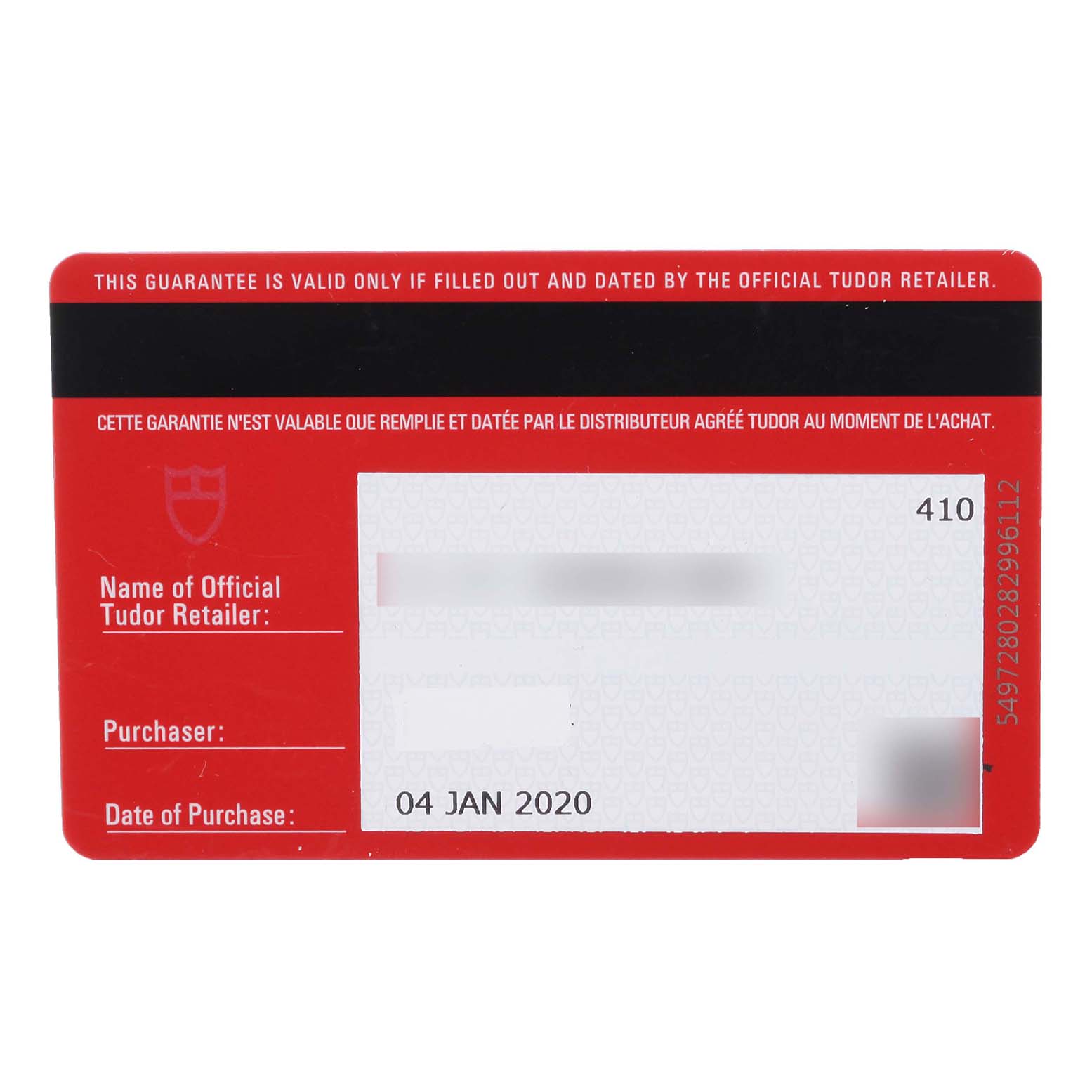 This is a warranty card for a Tudor Heritage Black Bay 79230DK Men's Stainless Steel Black Dial 79230DK Men's Stainless Steel Black Dial model, shown from a top-down angle.