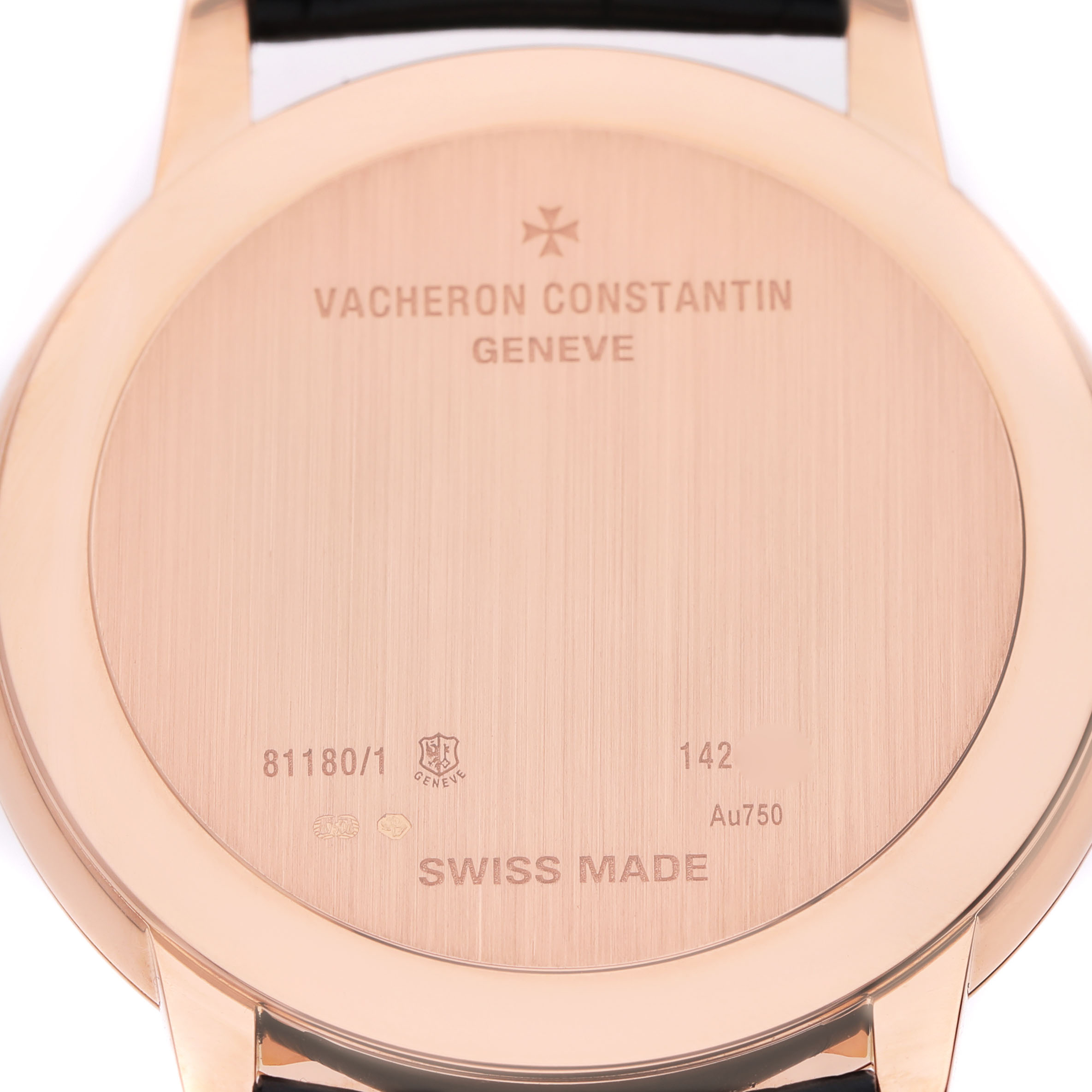 The image shows the case back of a Vacheron Constantin Patrimony 81180/000R-B518 Men's Rose Gold Blue Dial watch, displaying engravings and the brand name.