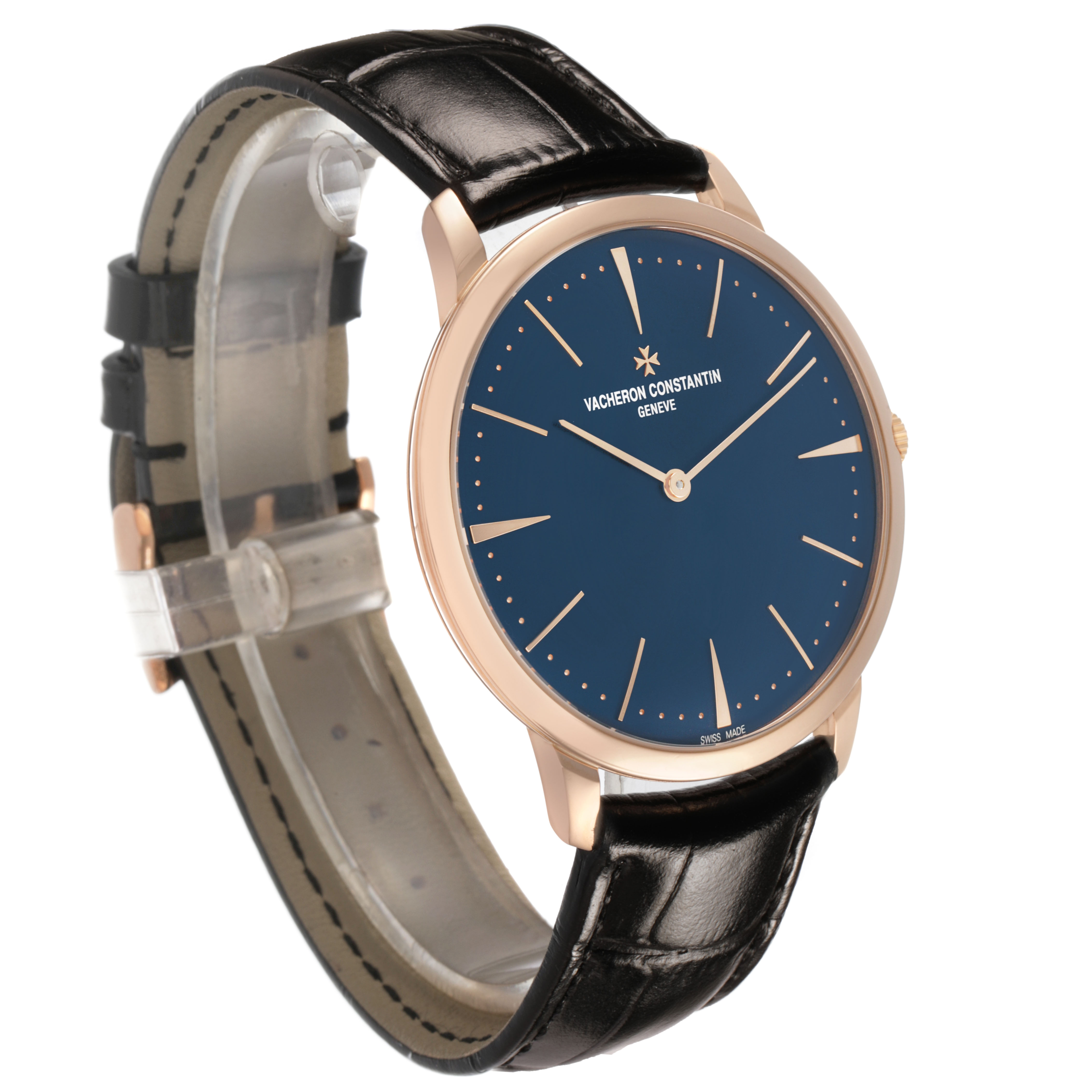 The Vacheron Constantin Patrimony 81180/000R-B518 Men's Rose Gold Blue Dial watch is shown at a three-quarter angle, highlighting the blue dial, gold case, and black leather strap.