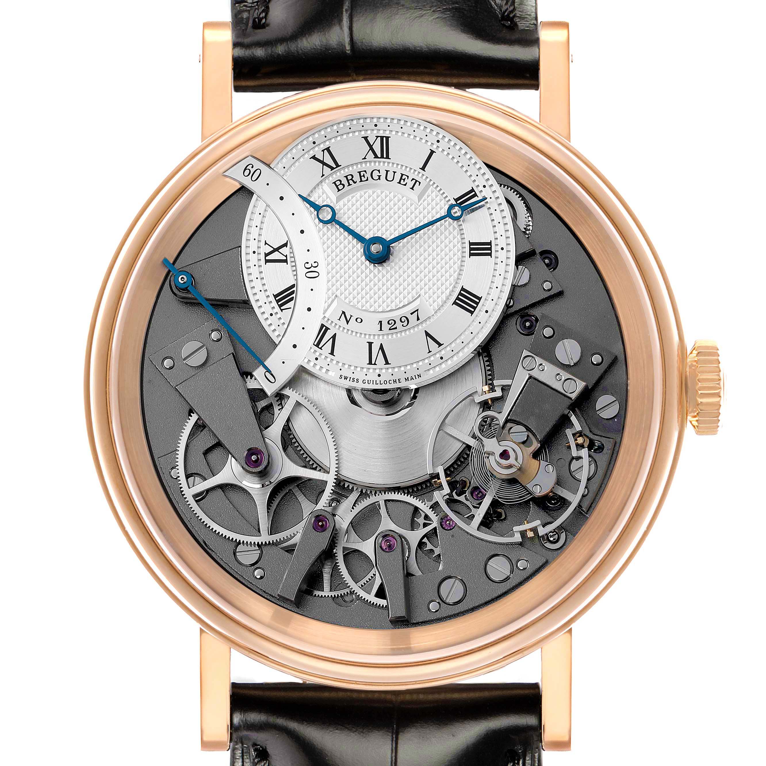 The Breguet Tradition 7097BR/G1/9WU Men
s Rose Gold Transparent Dial model is shown from the front, displaying its intricate movement and an off-center dial with Roman numerals.