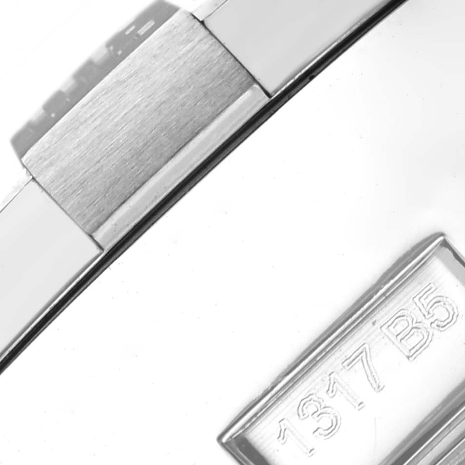 This close-up image shows part of the clasp and engraved serial number on a Breitling Avenger A1338111/A868 Men's Stainless Steel Mother of Pearl Dial A1338111/A868 Men's Stainless Steel Mother of Pearl Dial watch.