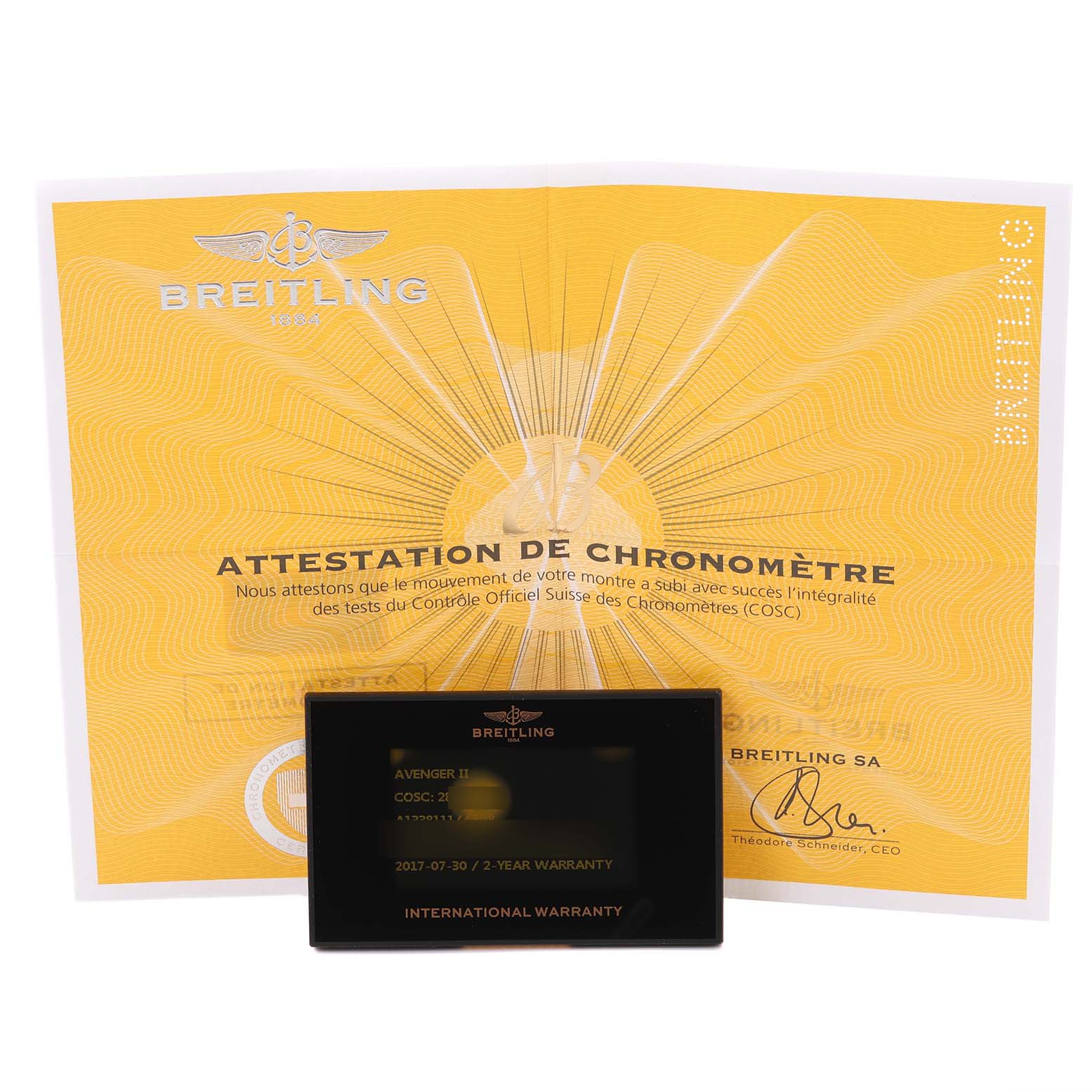 The image shows a Breitling Avenger A1338111/A868 Men's Stainless Steel Mother of Pearl Dial A1338111/A868 Men's Stainless Steel Mother of Pearl Dial warranty card and certificate at a front angle.