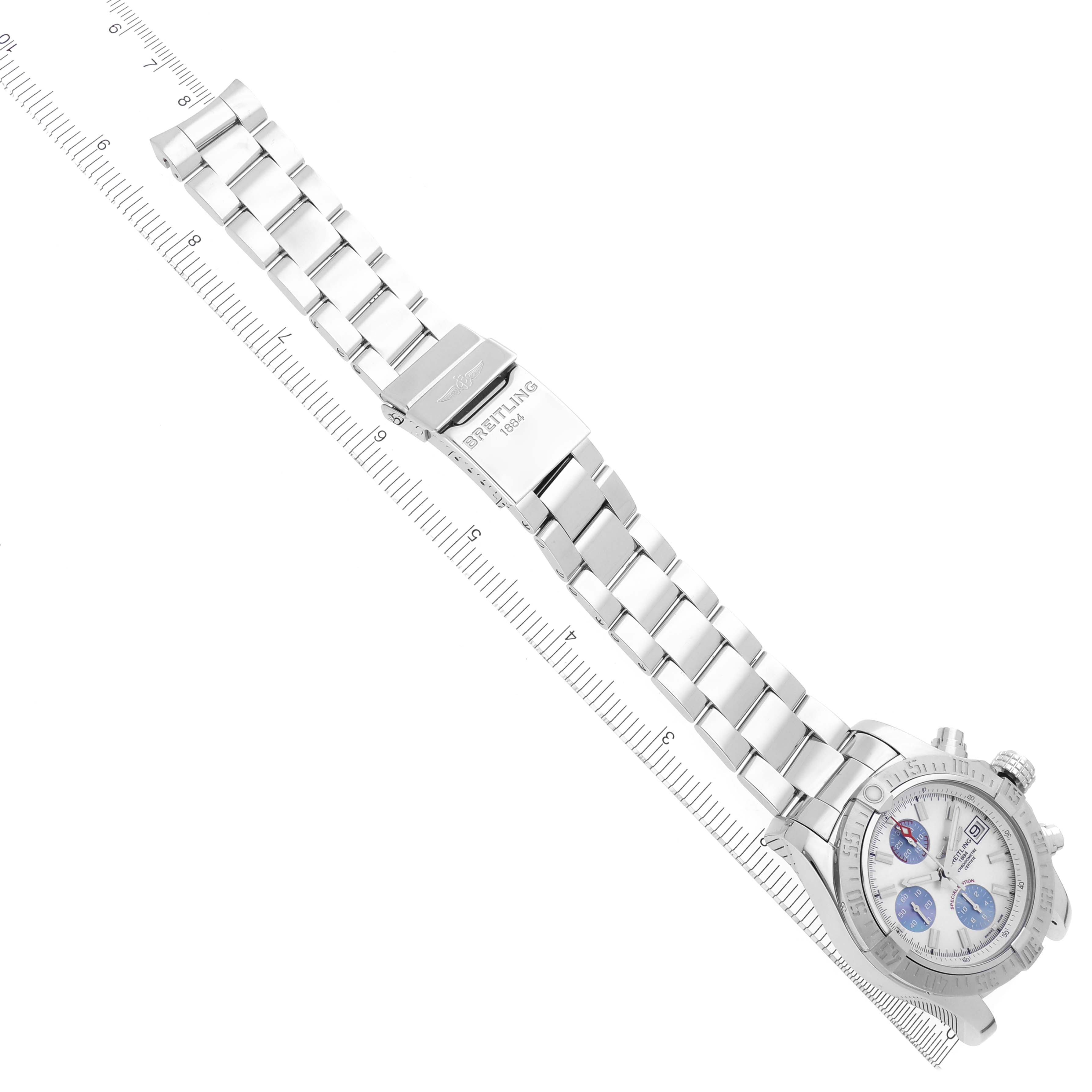 The Breitling Avenger A1338111/A868 Men's Stainless Steel Mother of Pearl Dial A1338111/A868 Men's Stainless Steel Mother of Pearl Dial watch is shown at an angled top view, displaying the dial, bracelet, and clasp.