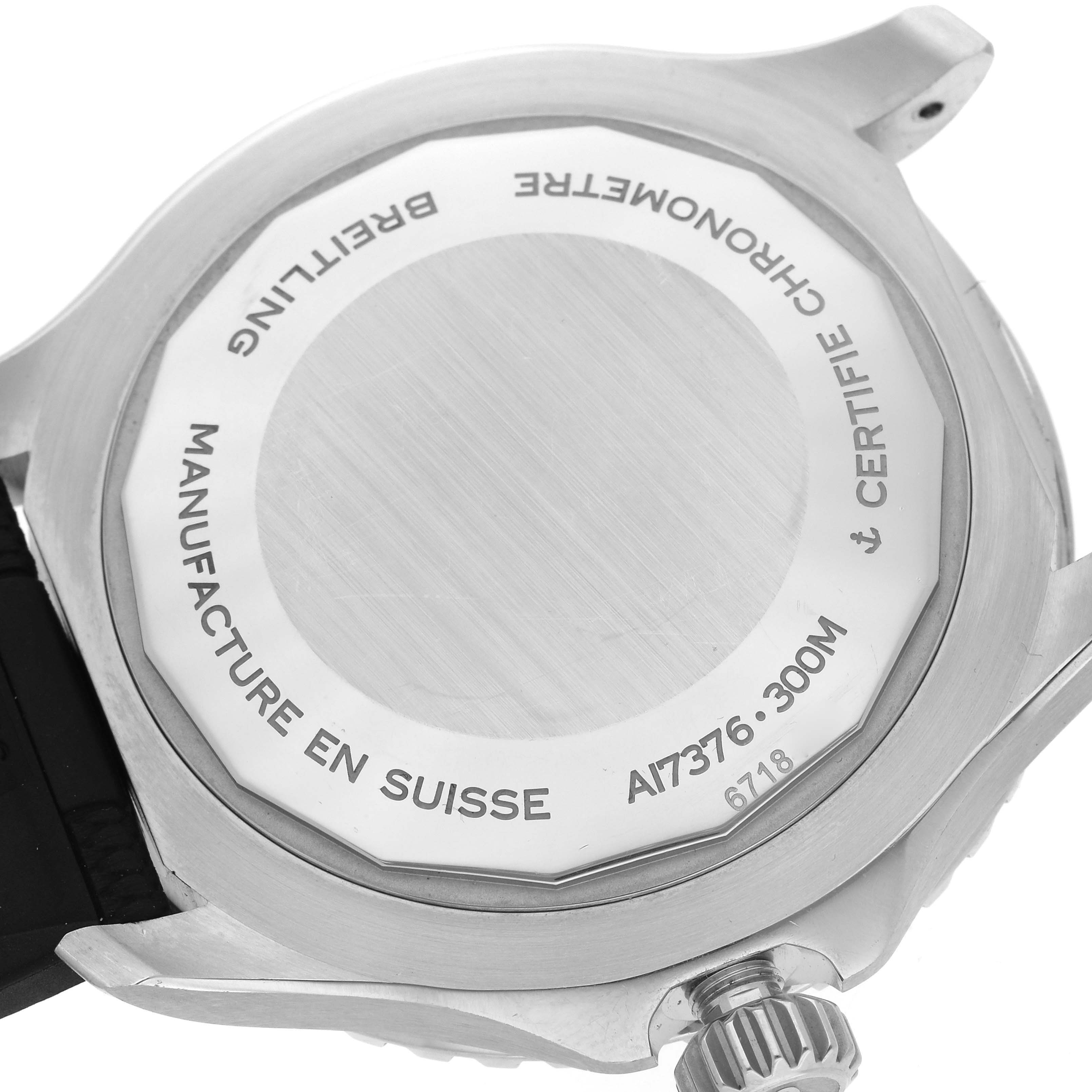 The image shows the back case and crown of a Breitling Superocean A17376 Men's Stainless Steel Blue Dial A17376 Men's Stainless Steel Blue Dial watch, highlighting its specifications and serial number.