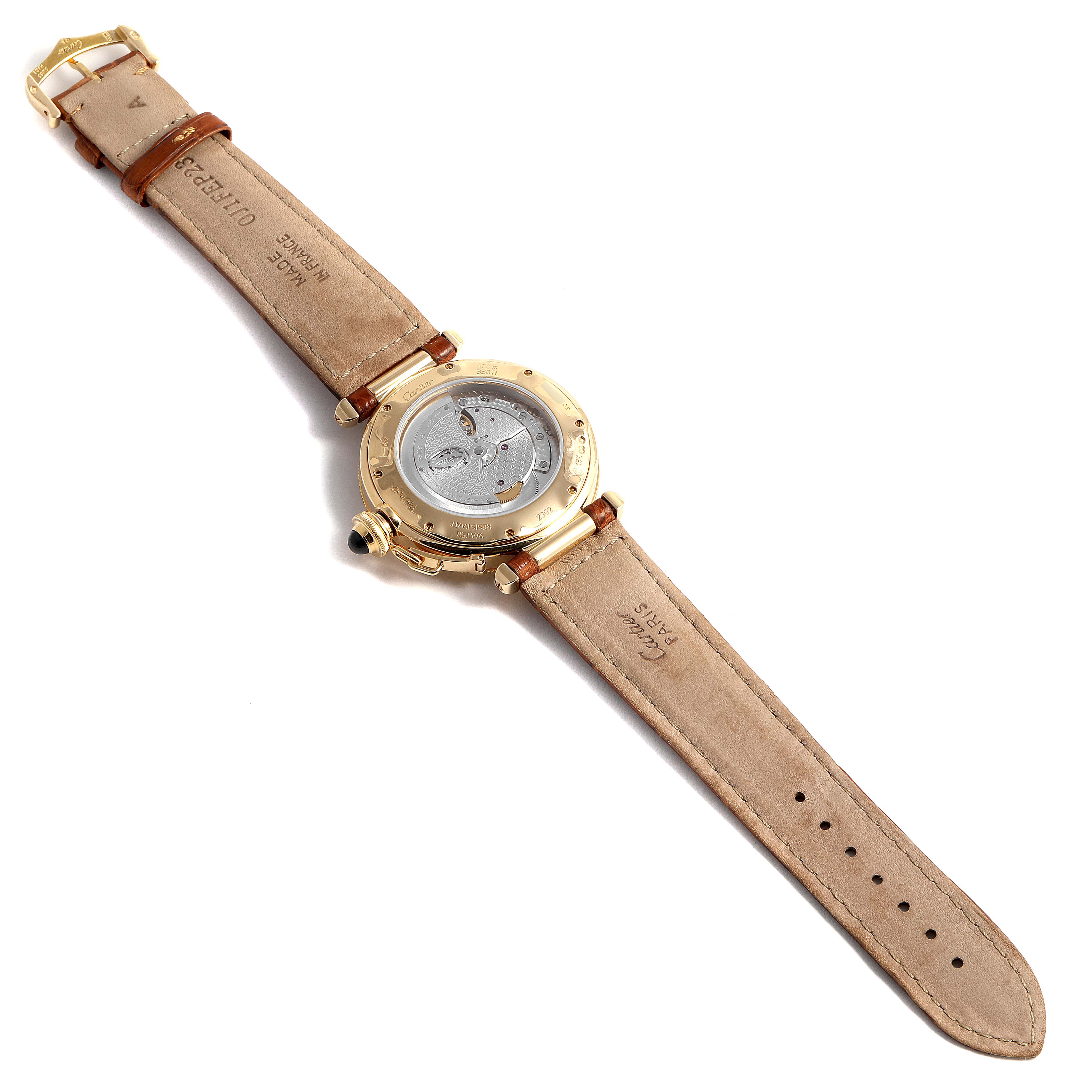 The image shows the back view of a Cartier Pasha W3004856 Men's Yellow Gold Silver Dial W3004856 Men's Yellow Gold Silver Dial watch, displaying the movement and leather strap, lying flat.