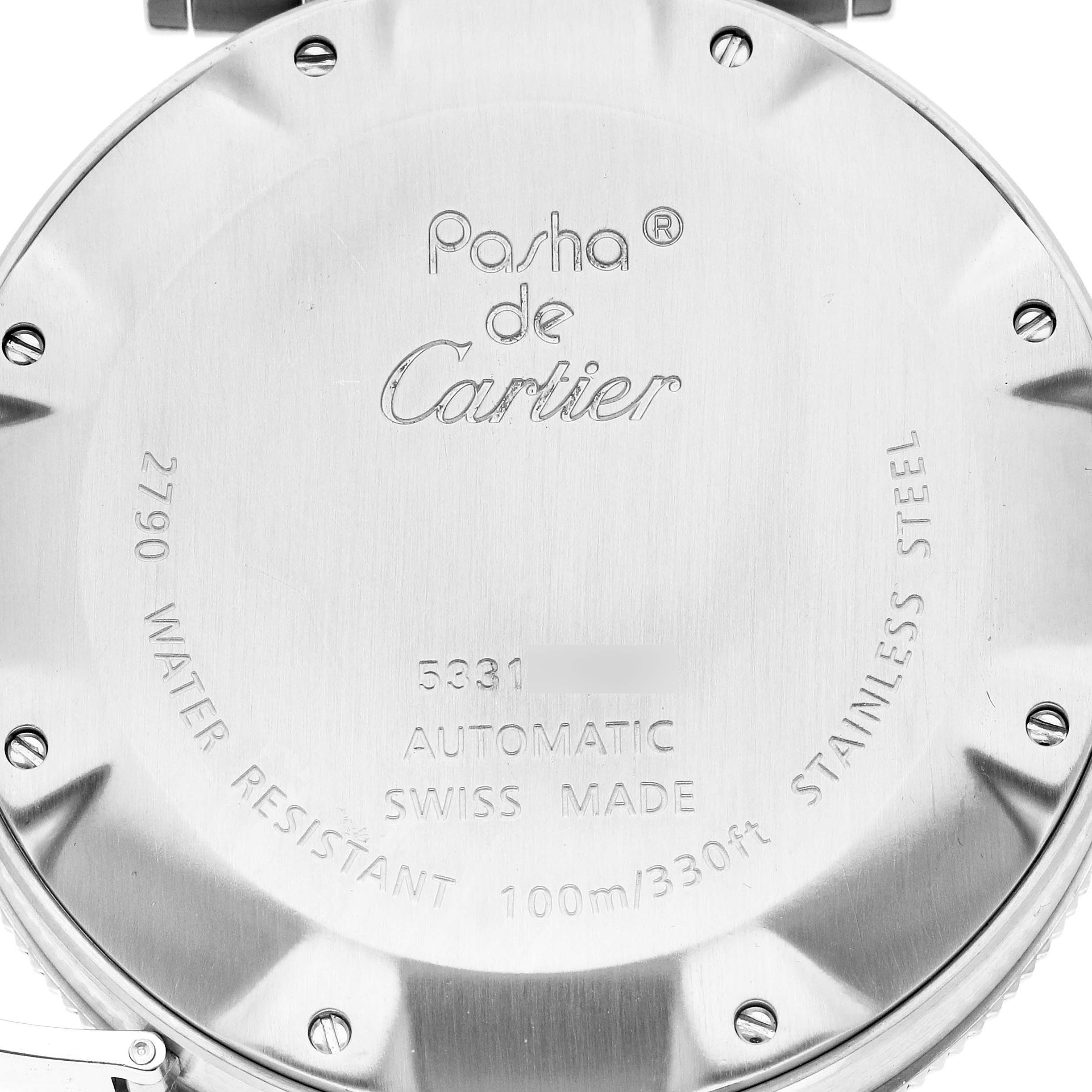 The image shows the back case of the Pasha de Cartier watch, highlighting its engraved branding and specifications.