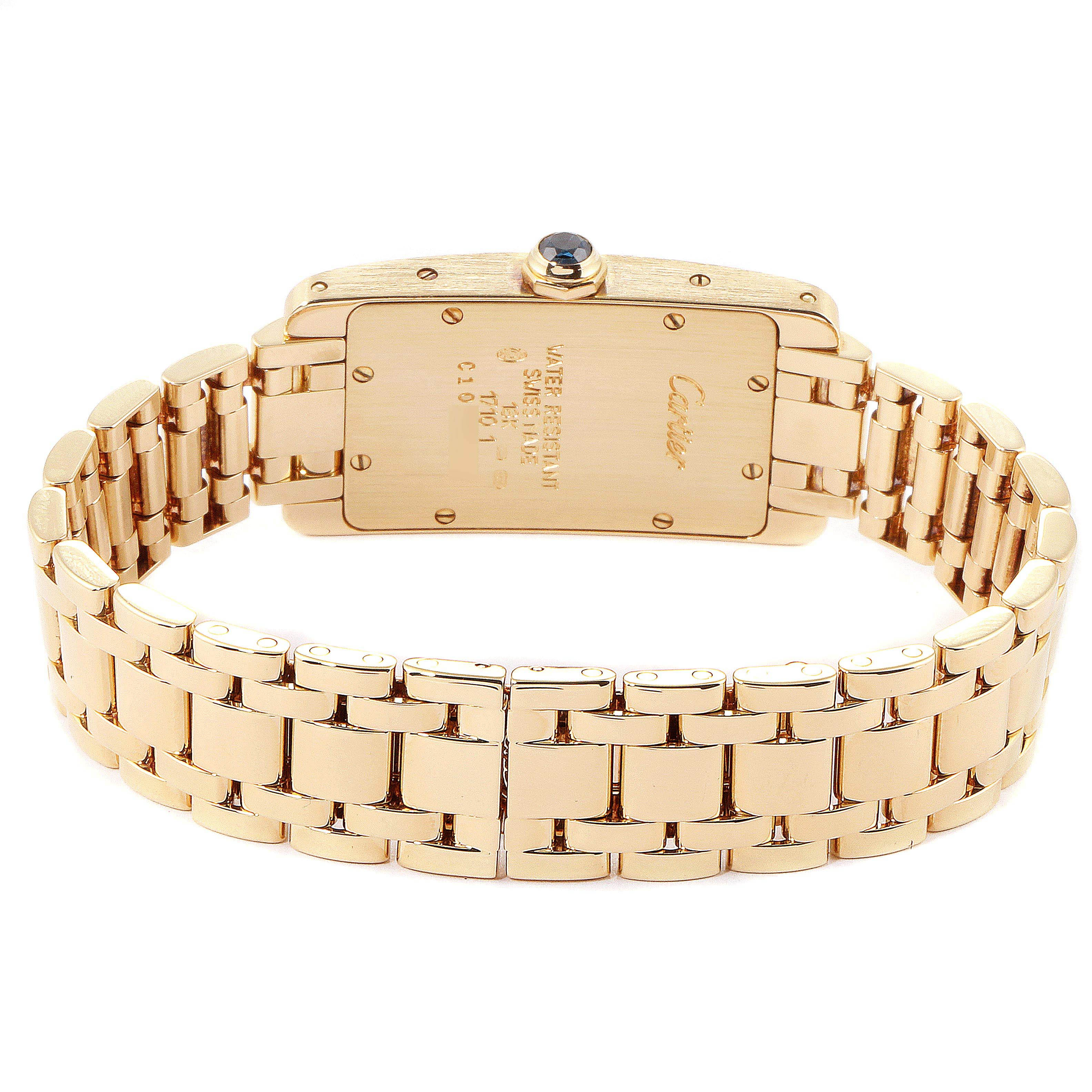 This image shows the back and bracelet of a Cartier Tank Americaine W26015K2 Women's Yellow Gold Silver Dial W26015K2 Women's Yellow Gold Silver Dial watch, highlighting its gold case and links.