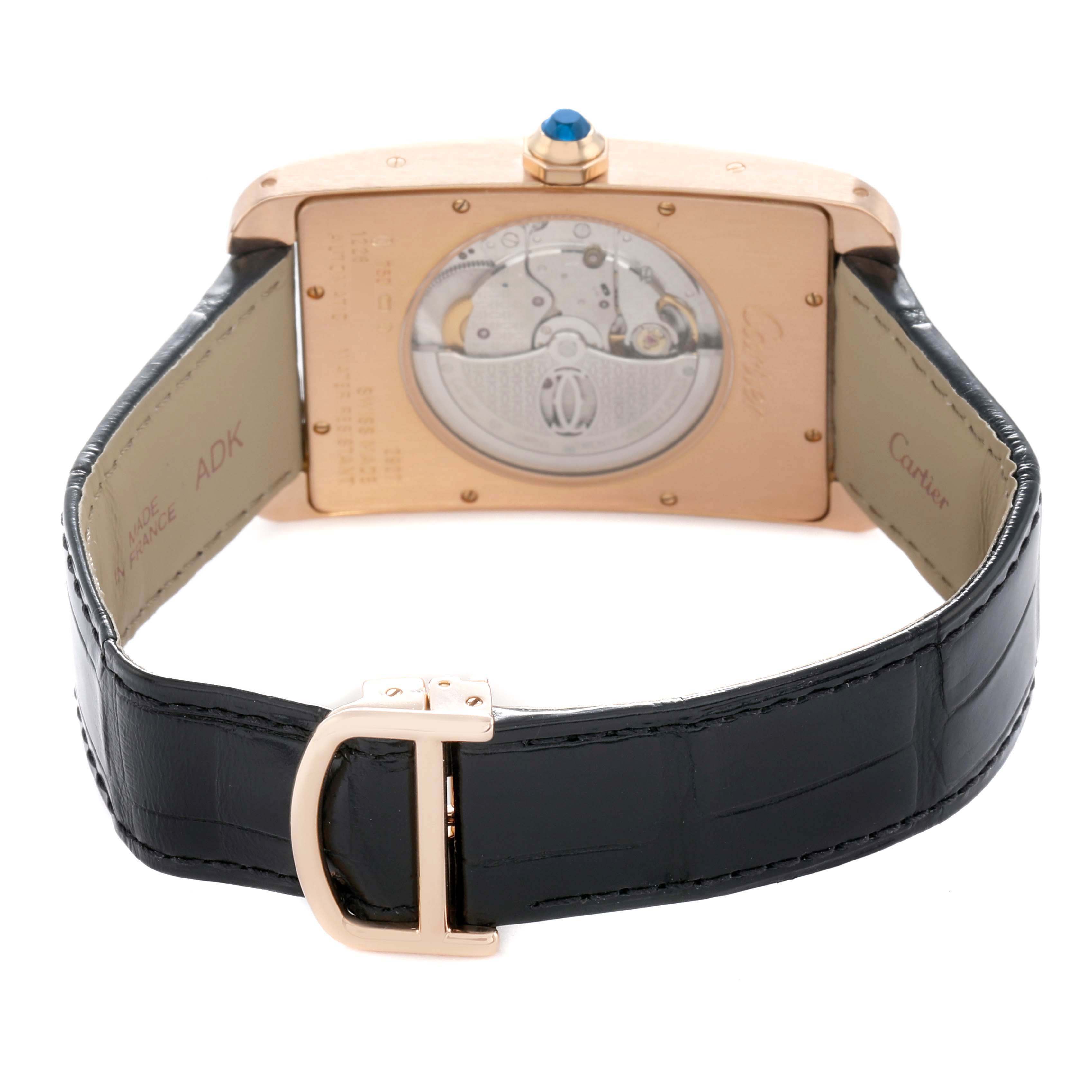 The Cartier Tank Americaine W2609856 Men
s Rose Gold Silver Dial is shown from the back, highlighting its transparent case back and black leather strap.