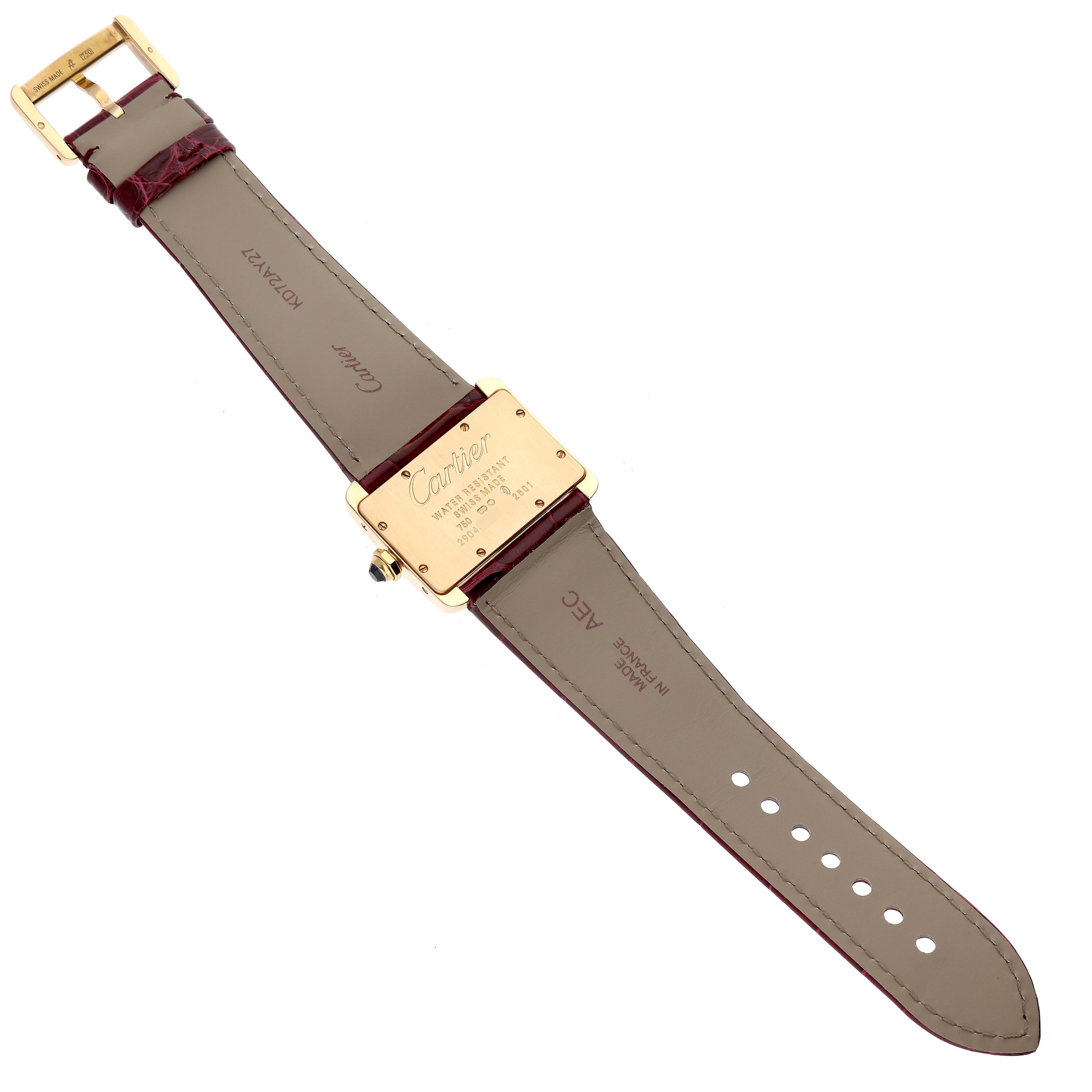 The Cartier Tank Divan W6300356 Women's Yellow Gold Silver Dial W6300356 Women's Yellow Gold Silver Dial watch is shown from the back, displaying the strap and case back.