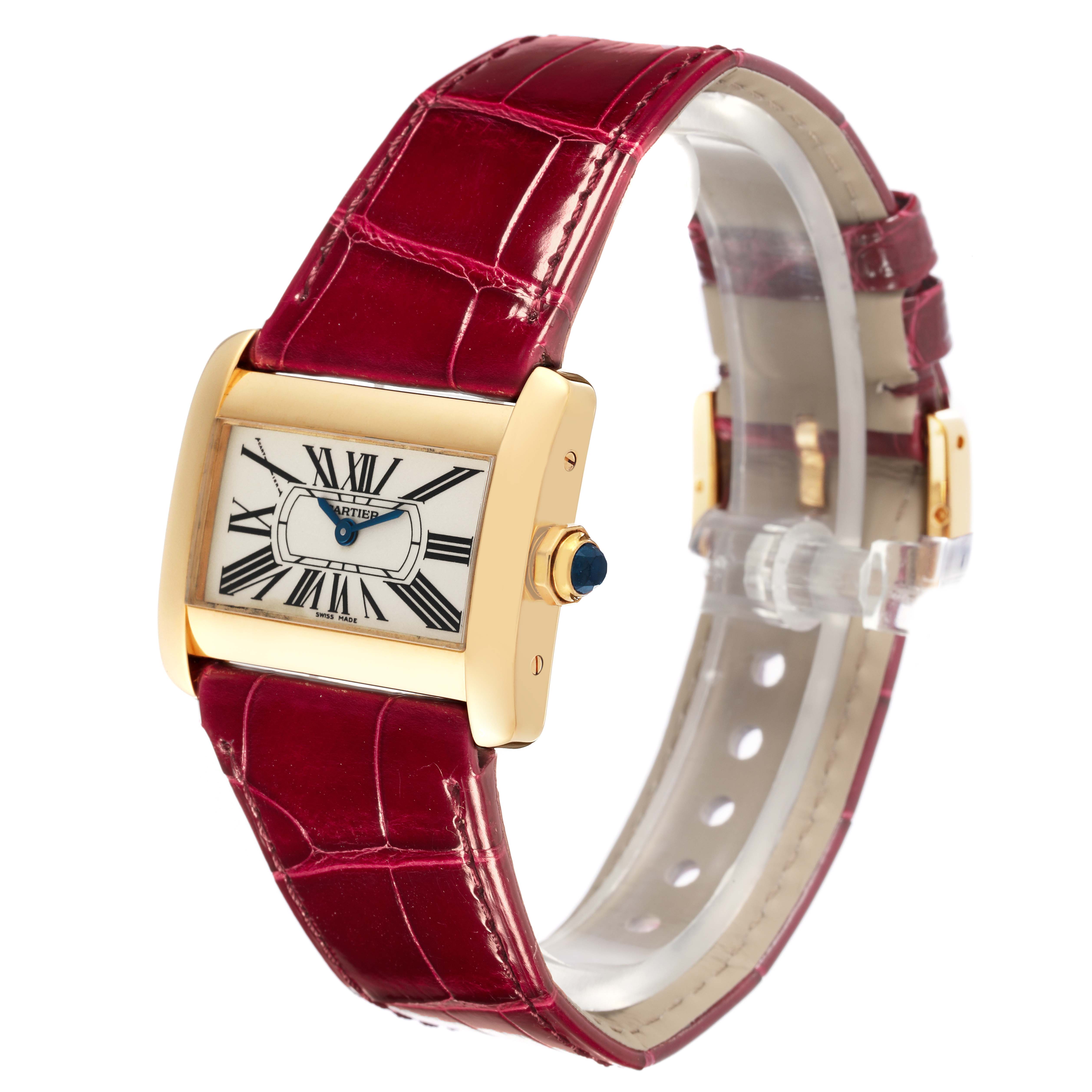 The Cartier Tank Divan W6300356 Women's Yellow Gold Silver Dial W6300356 Women's Yellow Gold Silver Dial watch is shown at a three-quarter angle, featuring its rectangular face, crown, and red leather strap.