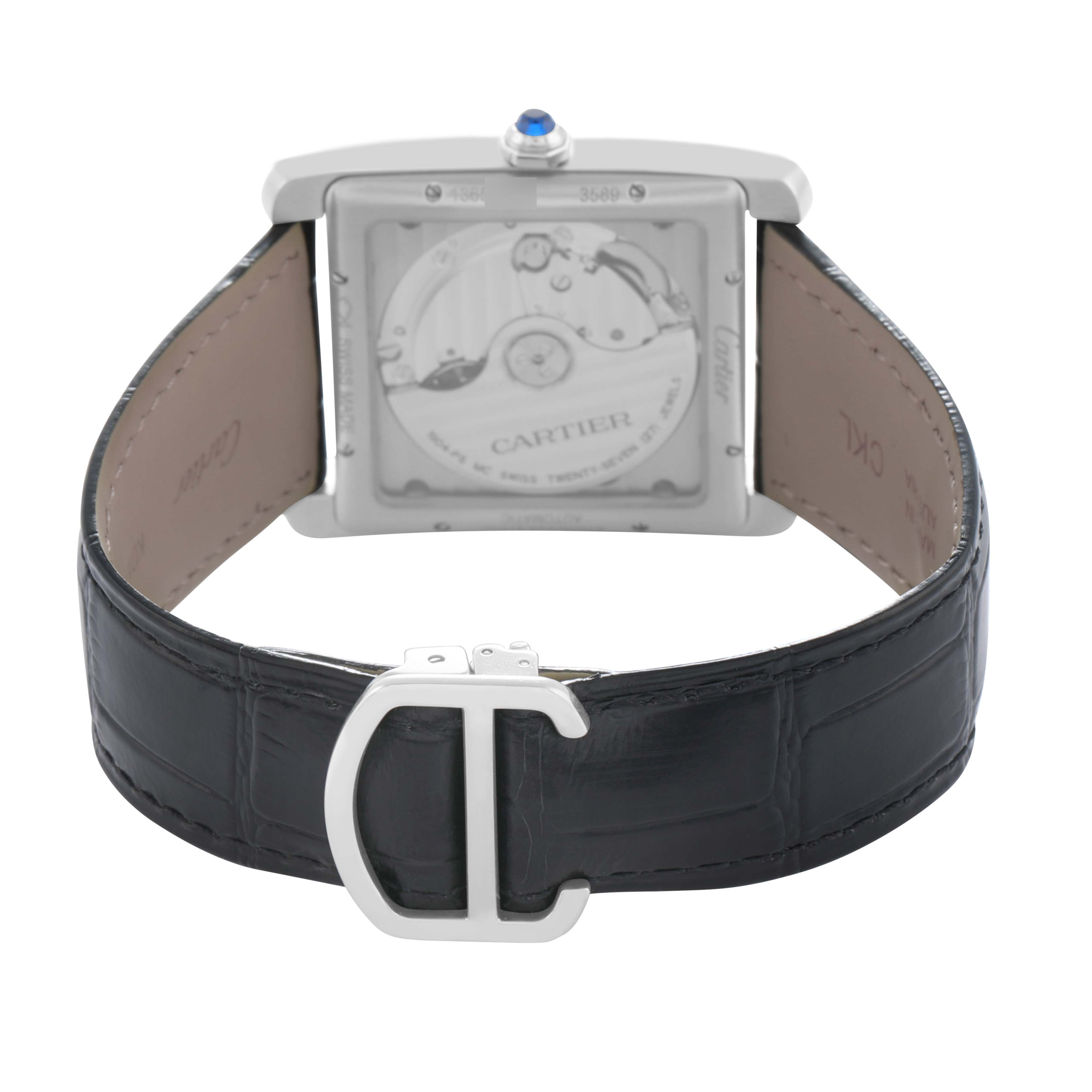 The Cartier Tank MC W5330003 Men
s Stainless Steel Silver Dial watch is shown from the back, displaying its movement and leather strap with a visible buckle.
