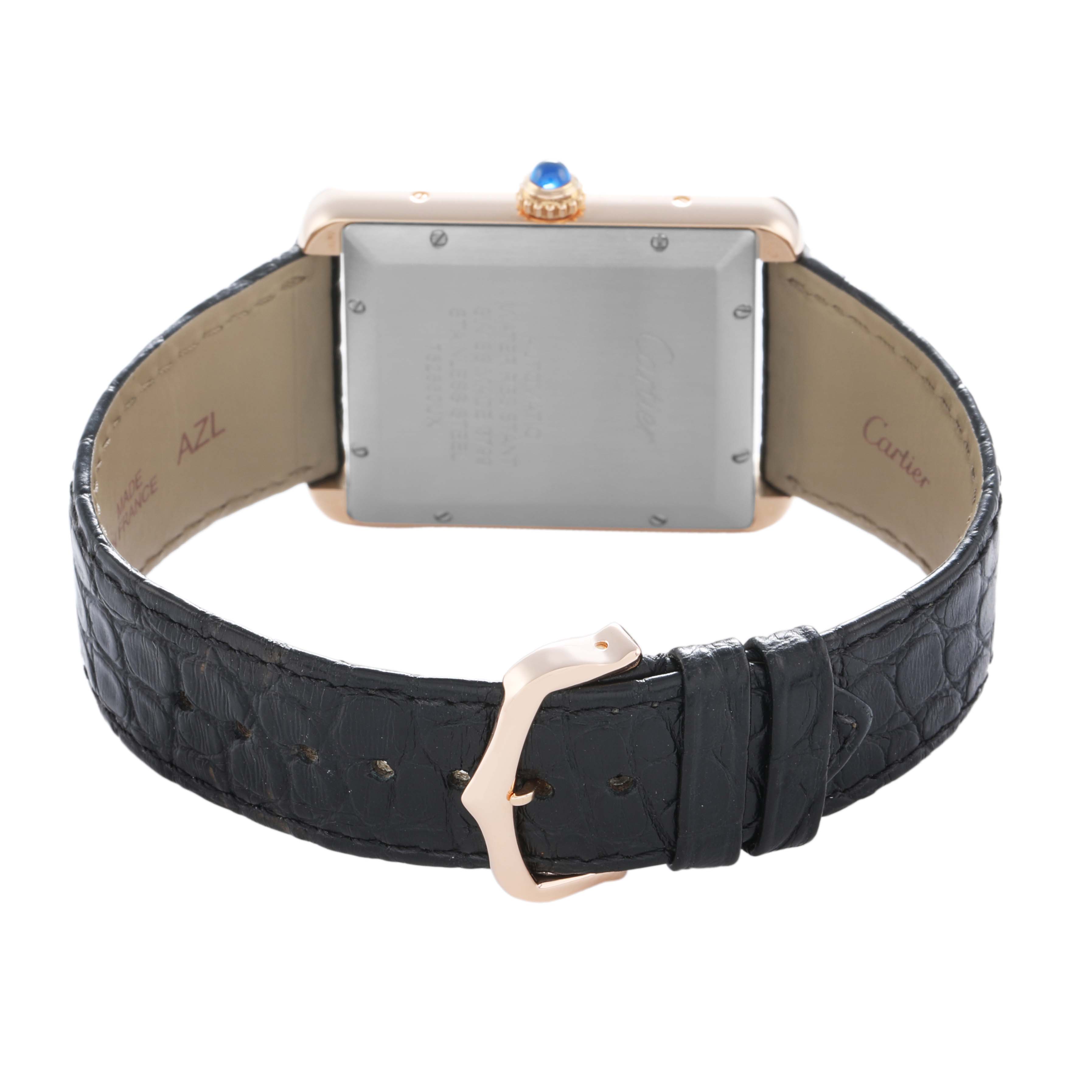 The image shows the back view of a Tank Solo by Cartier, highlighting the case back, crown, and leather strap with buckle.