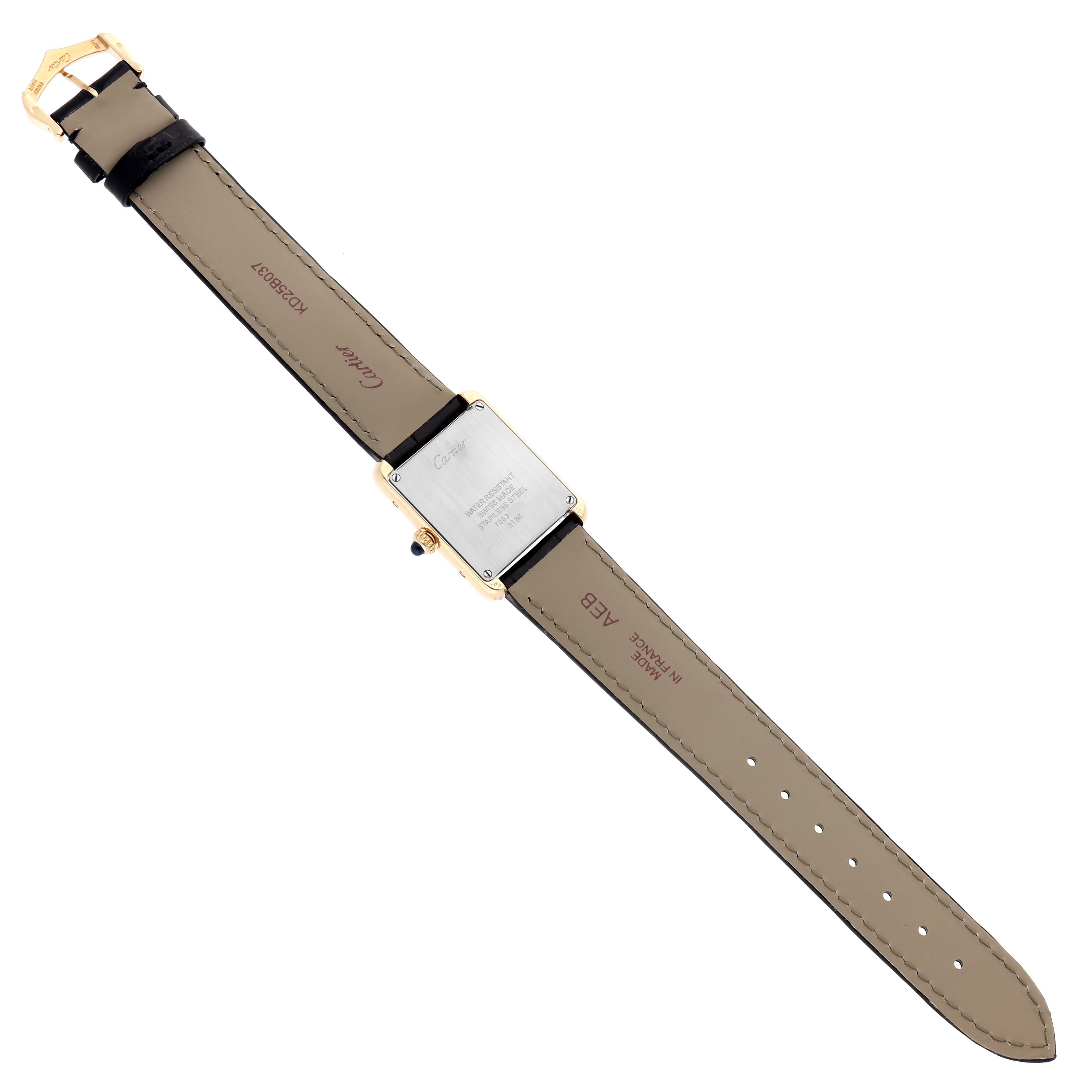 The Cartier Tank Solo W5200002 Women
s Steel and Gold (two tone) Silver Dial watch is shown from the back, displaying the case back, strap, and buckle.