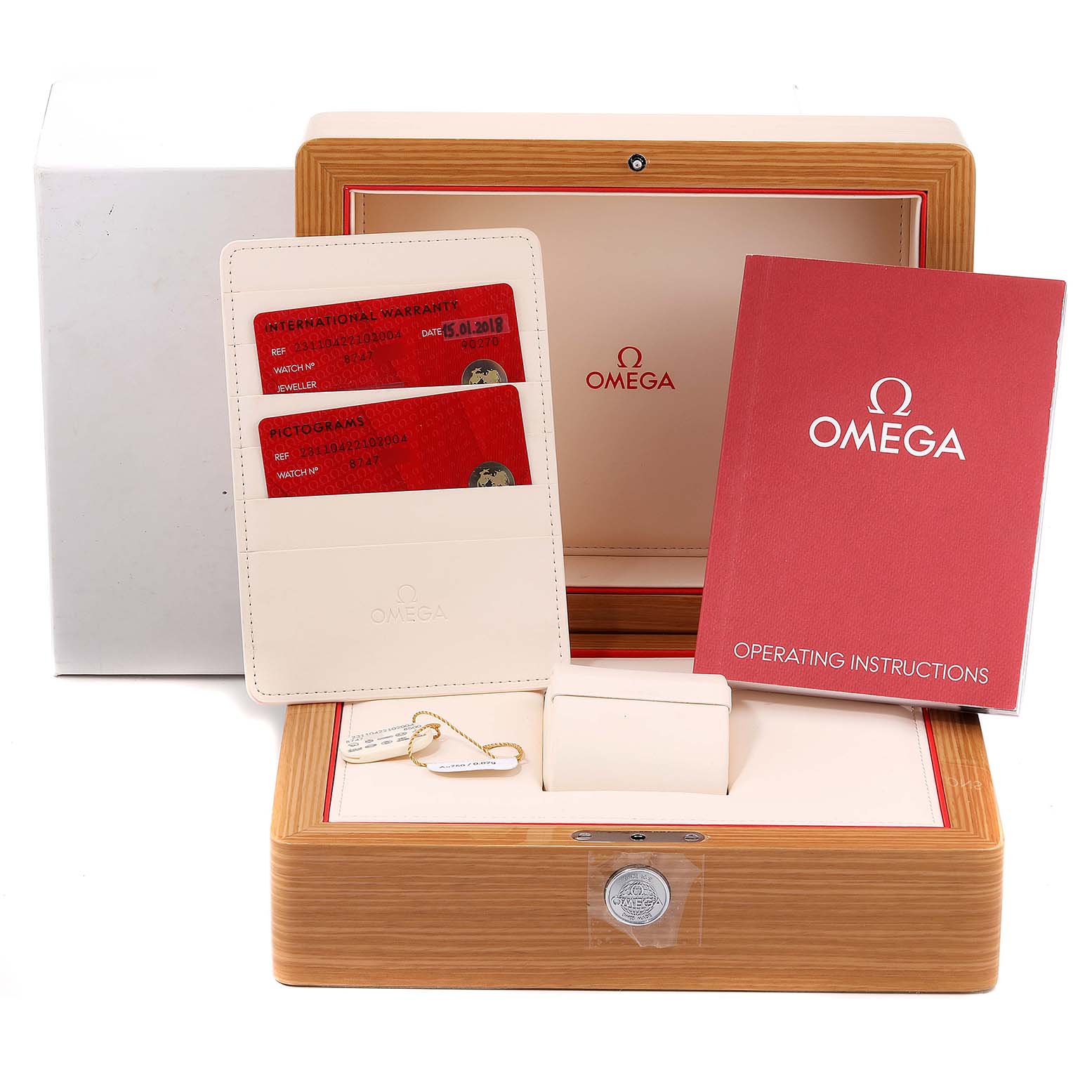 This image shows the Omega Aqua Terra 231.10.42.21.02.004 Men
s Stainless Steel Silver Dial 231.10.42.21.02.004 Men
s Stainless Steel Silver Dial watch box, operating instructions, warranty cards, and accessories from a top angle.