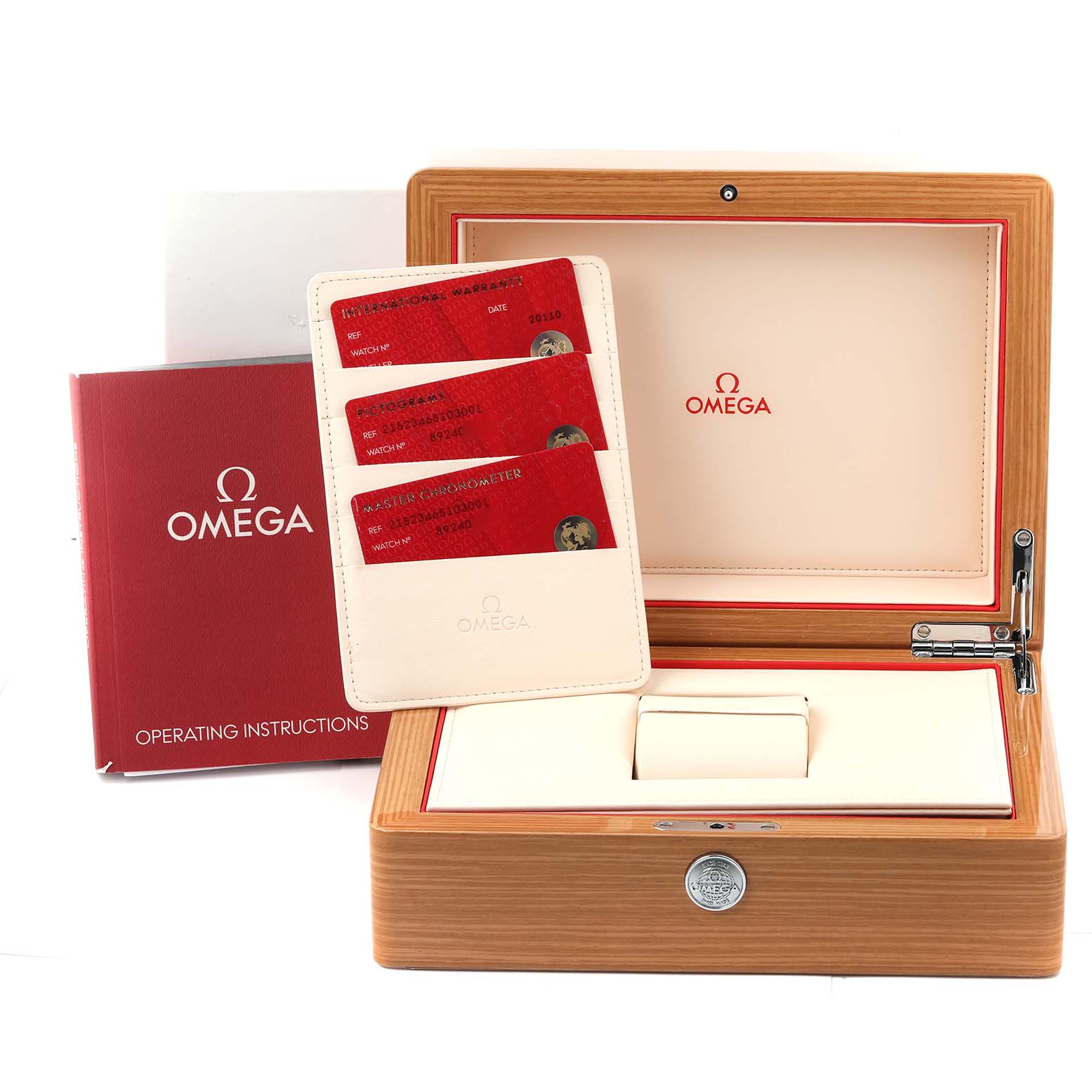 This image shows the packaging for an Omega Planet Ocean 215.23.46.51.03.001 Men's Steel and Gold (two tone) Blue Dial 215.23.46.51.03.001 Men's Steel and Gold (two tone) Blue Dial model, including the wooden box, operating instructions, and warranty cards.