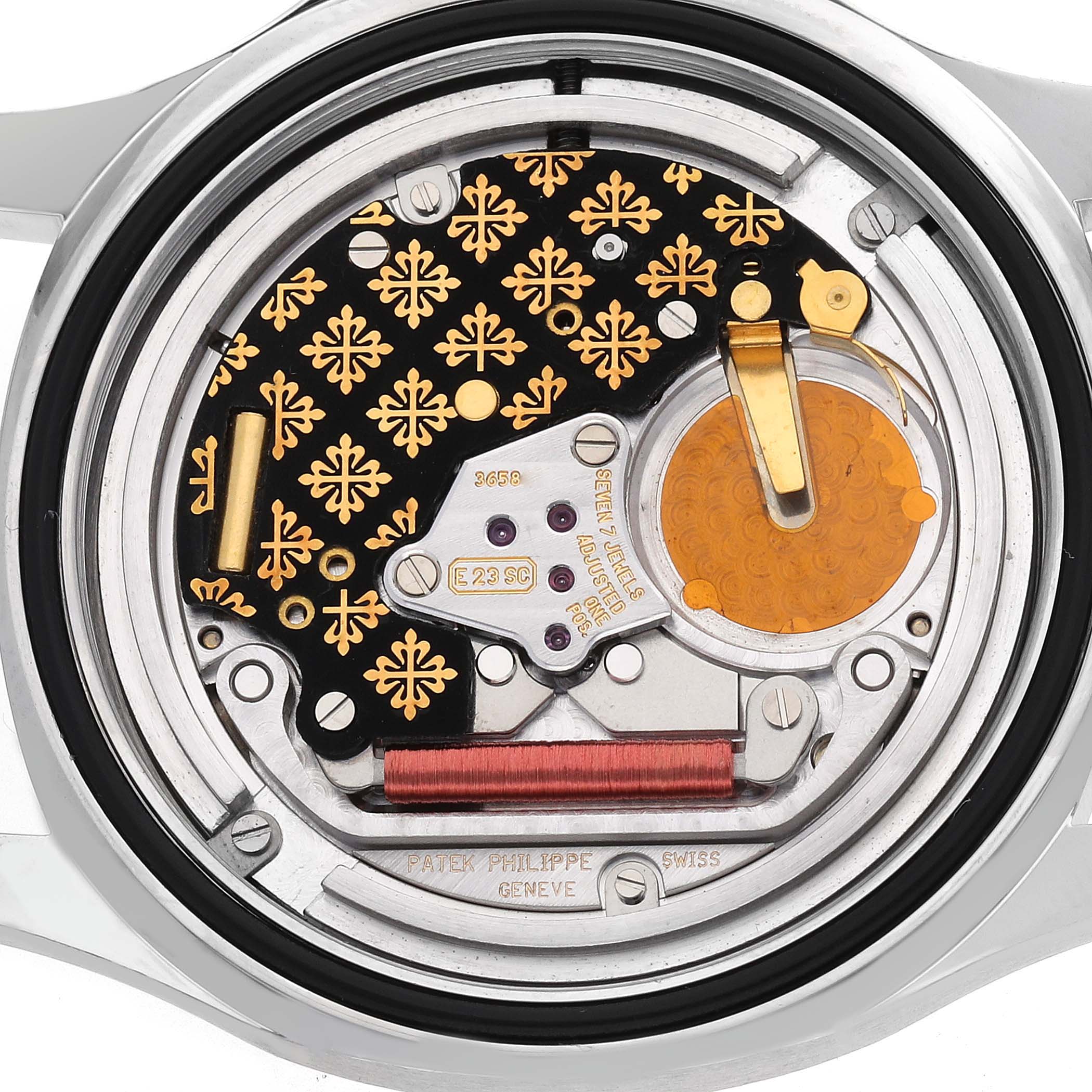 This image shows the back view of a Patek Philippe Aquanaut 5067A-014 Women
s Stainless Steel Black Dial watch, highlighting its intricate mechanical movement.