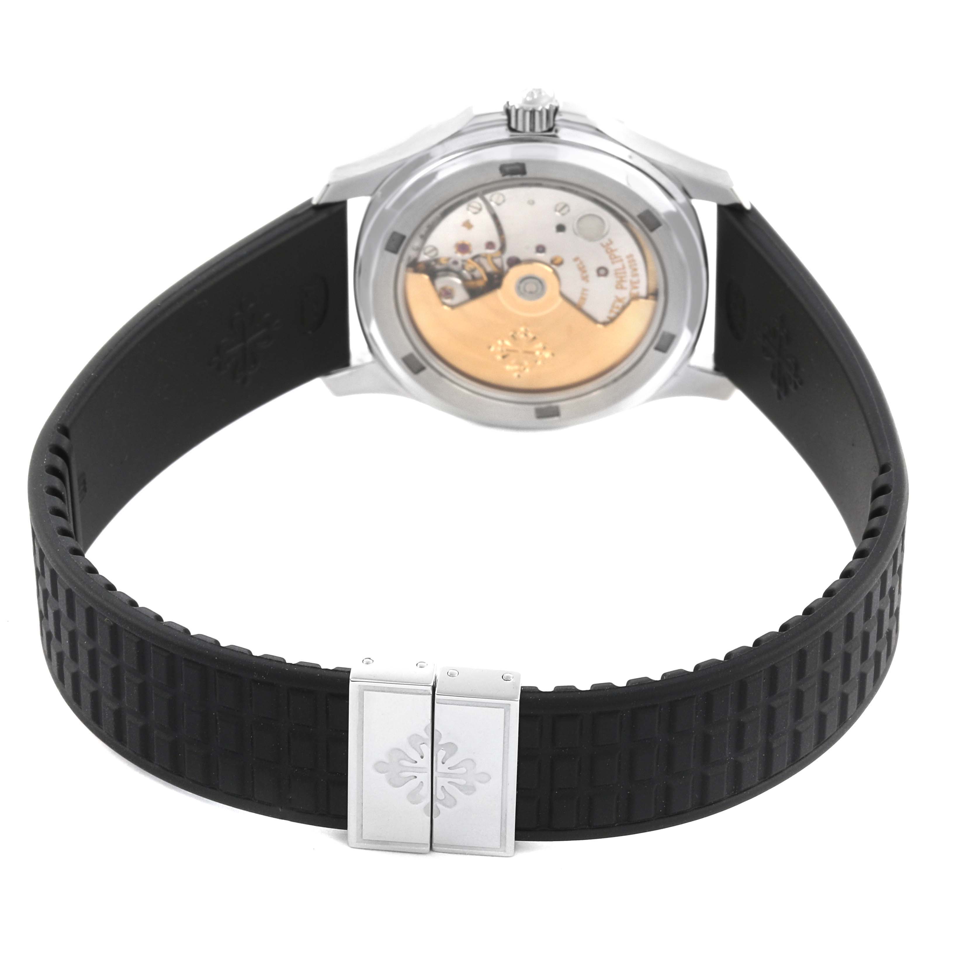 The image shows the back view of the Patek Philippe Aquanaut 5066A Men
s Stainless Steel Black Dial watch, highlighting the movement through a transparent case back and the clasp.