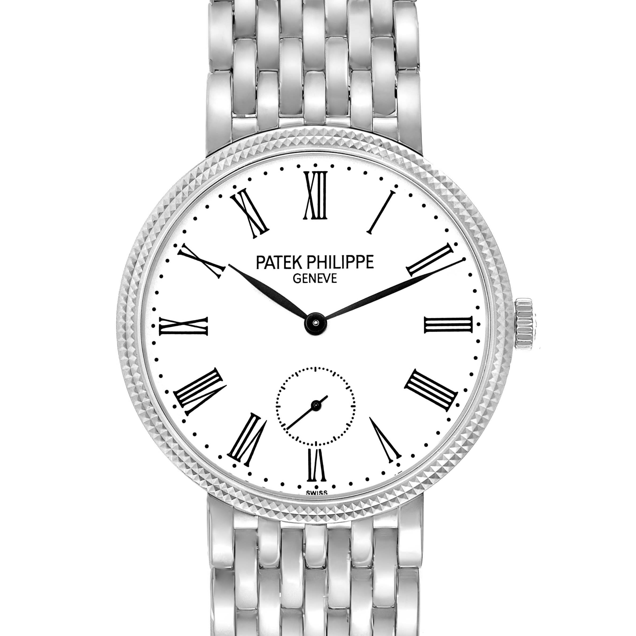 The Patek Philippe Calatrava 7119G Women
s White Gold White Dial watch is shown from a front angle, displaying the face with Roman numerals and a metal bracelet.