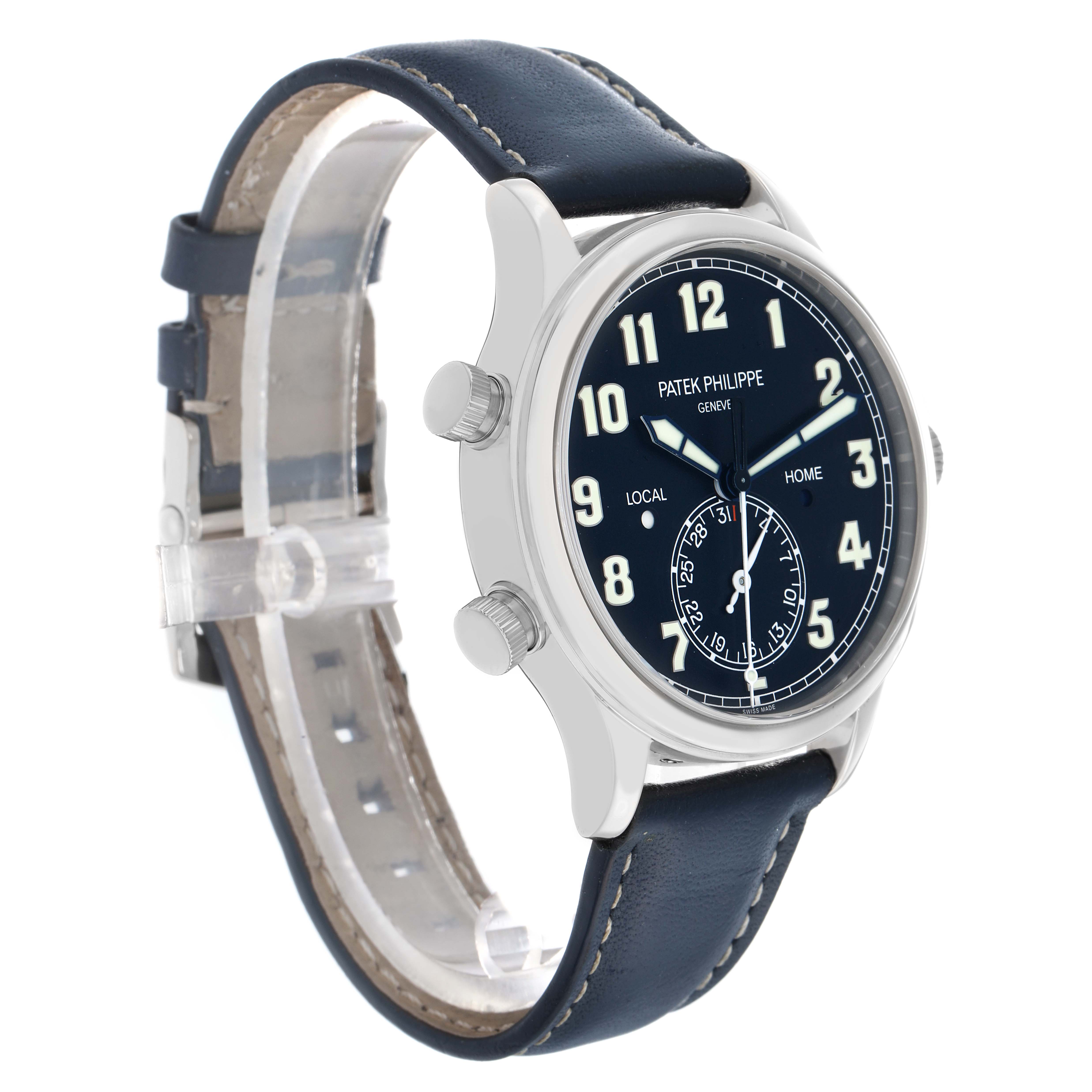 The Patek Philippe Calatrava 5524G Men
s White Gold Blue Dial watch is shown at a side angle, displaying the face, crown, and pushers, with a navy leather strap.