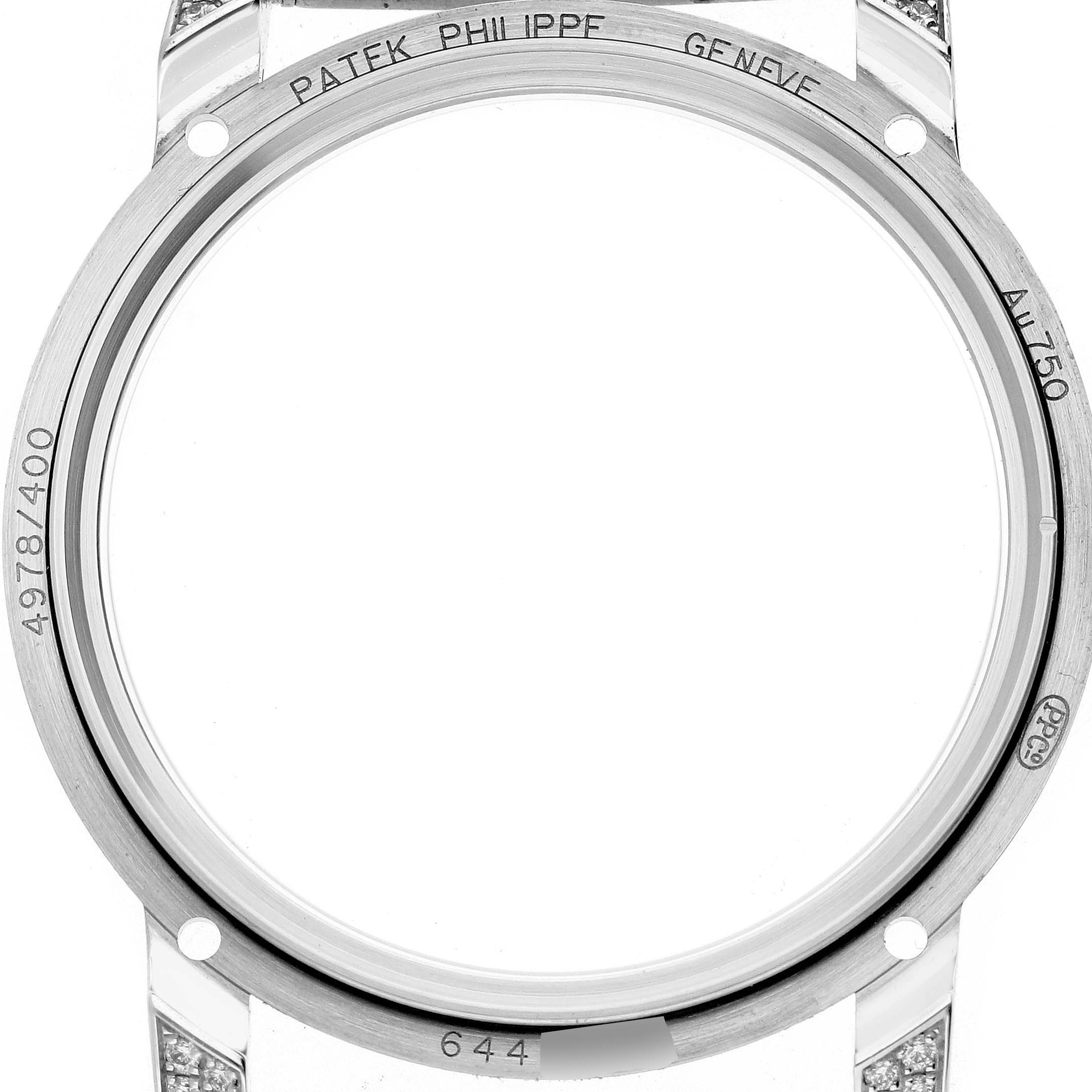 The image shows the front angle of a Patek Philippe Calatrava 4978 Women's White Gold Silver Dial 4978 Women's White Gold Silver Dial watch case, featuring engravings and attachment points.