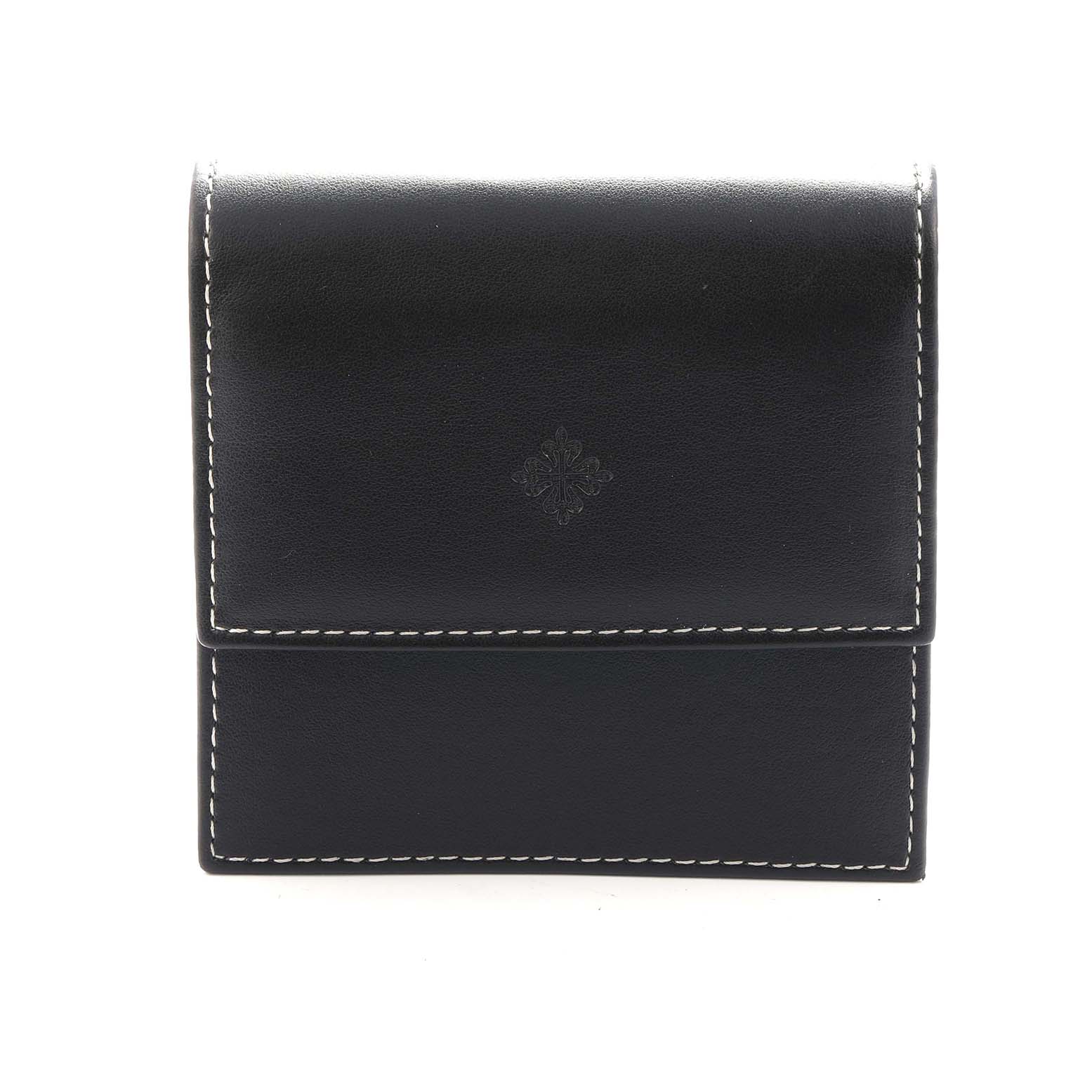 This is a front view of a black leather pouch with white stitching, designed for a Patek Philippe Calatrava 5119J-001 Men
s Yellow Gold White Dial watch.
