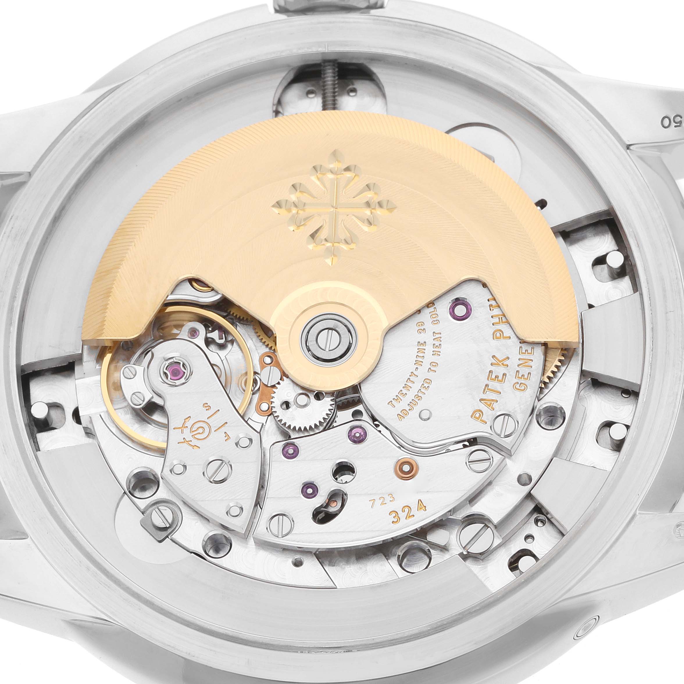The image shows the back view of a Patek Philippe Complications 5320G Men
s White Gold Beige Dial watch, highlighting its intricate movement with a visible rotor.