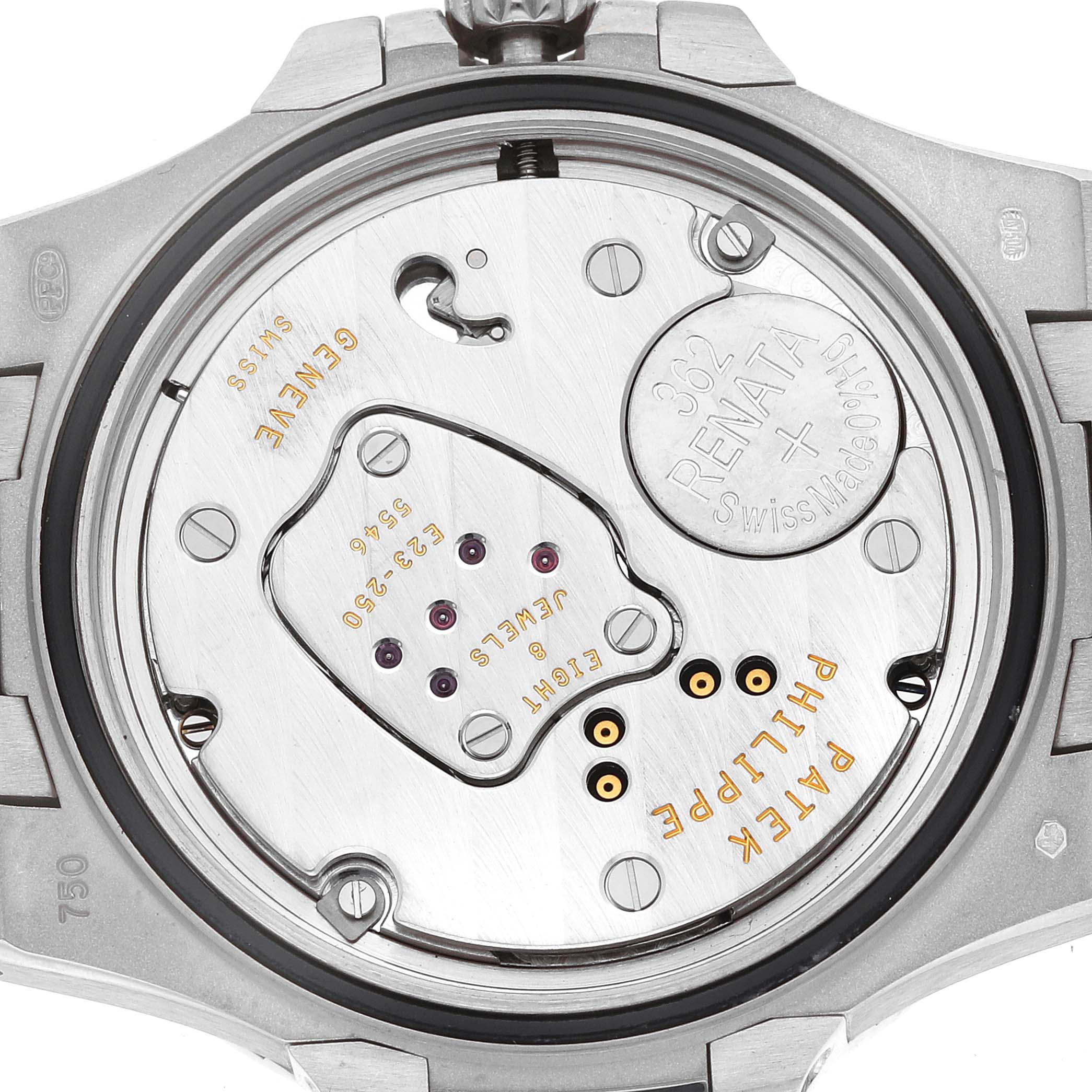 The image shows the back view of a Patek Philippe Nautilus 7010G-010 Women
s White Gold Silver Dial watch, focusing on the movement and battery compartment.