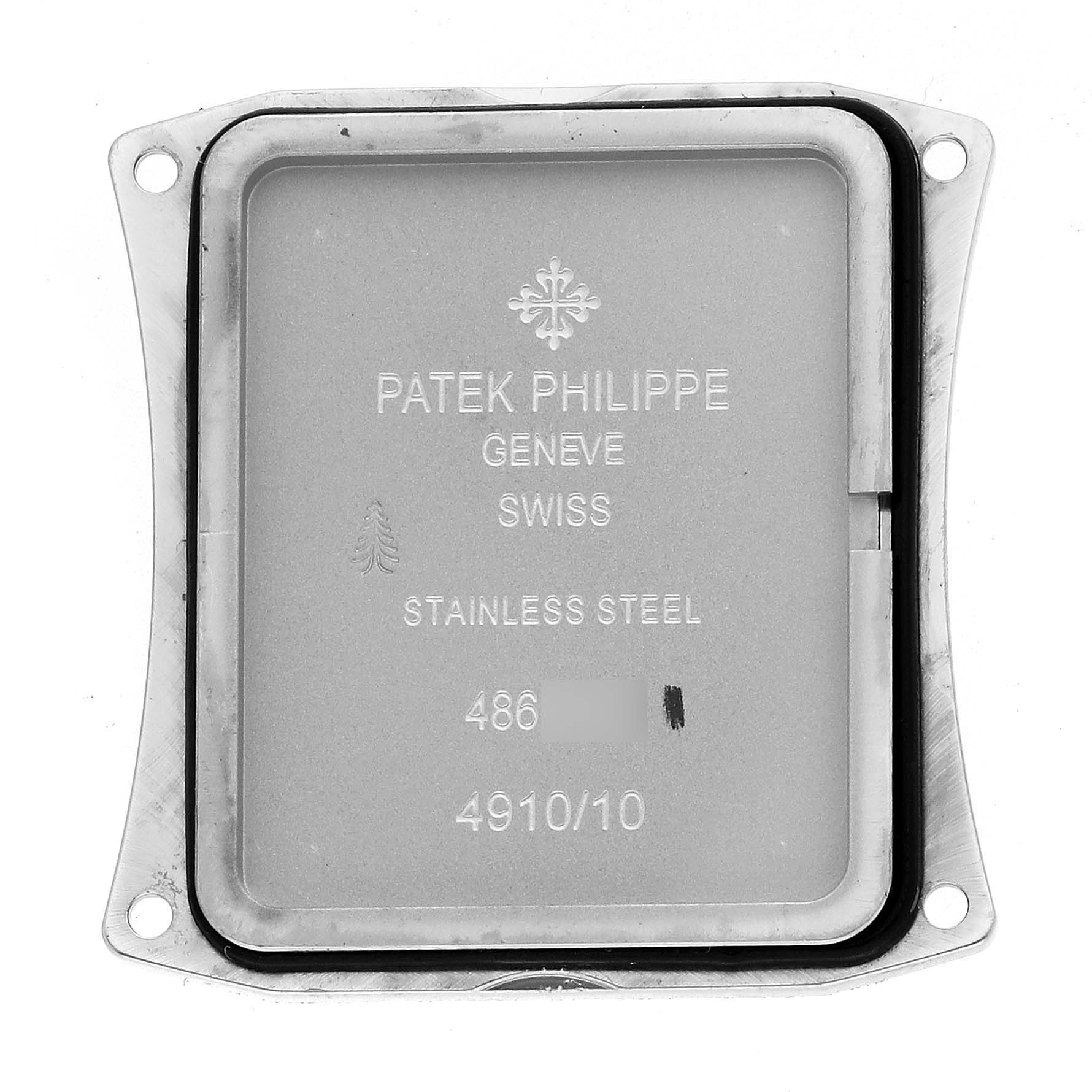 The image shows the back case of the Patek Philippe Twenty-4 4910/10A-010 Women
s Stainless Steel Silver Dial, displaying brand inscriptions and serial numbers.