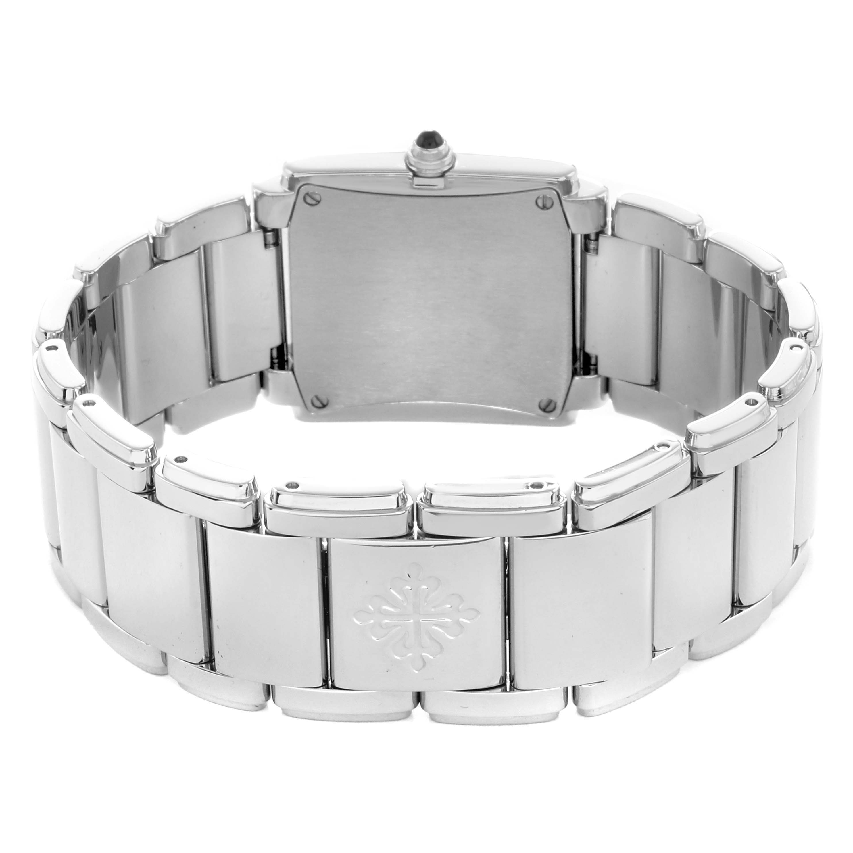 The image shows the back view of a Patek Philippe Twenty-4 4910/10A-010 Women
s Stainless Steel Silver Dial watch, highlighting its bracelet and clasp.