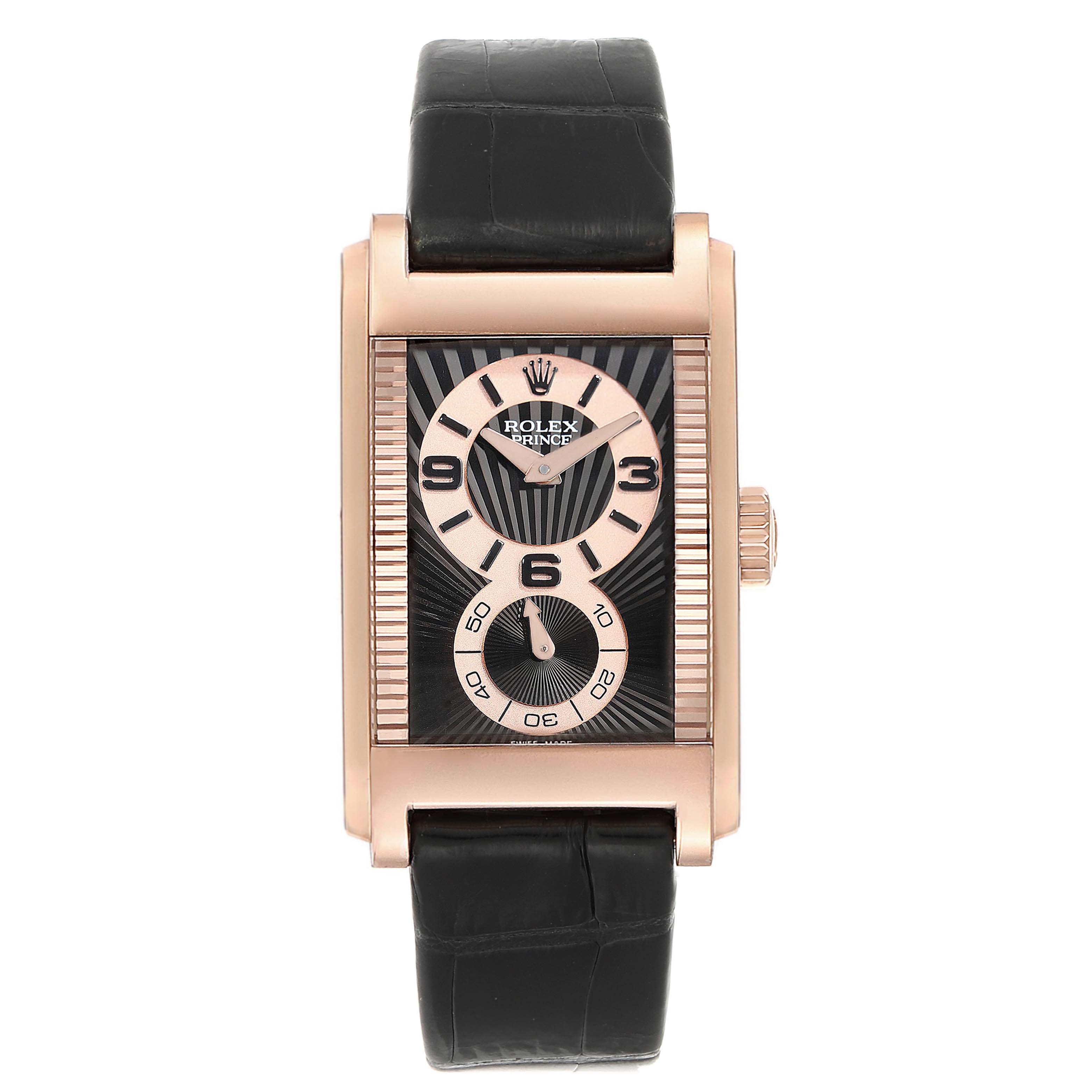 The image shows a front view of a Rolex Cellini 5442 Men
s Rose Gold Black Dial 5442 Men
s Rose Gold Black Dial watch with a rectangular case and a black leather strap.