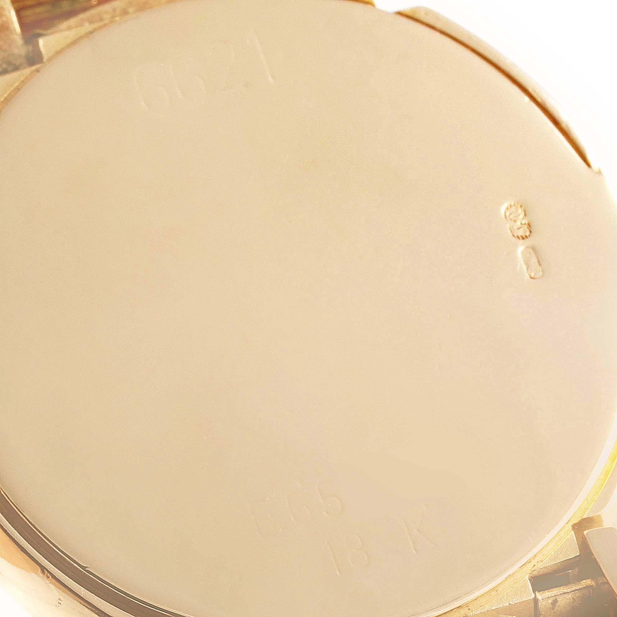 This image shows the back casing of a Rolex Cellini 6621 Women's Yellow Gold White Dial 6621 Women's Yellow Gold White Dial watch, primarily displaying its engravings and metal finish.