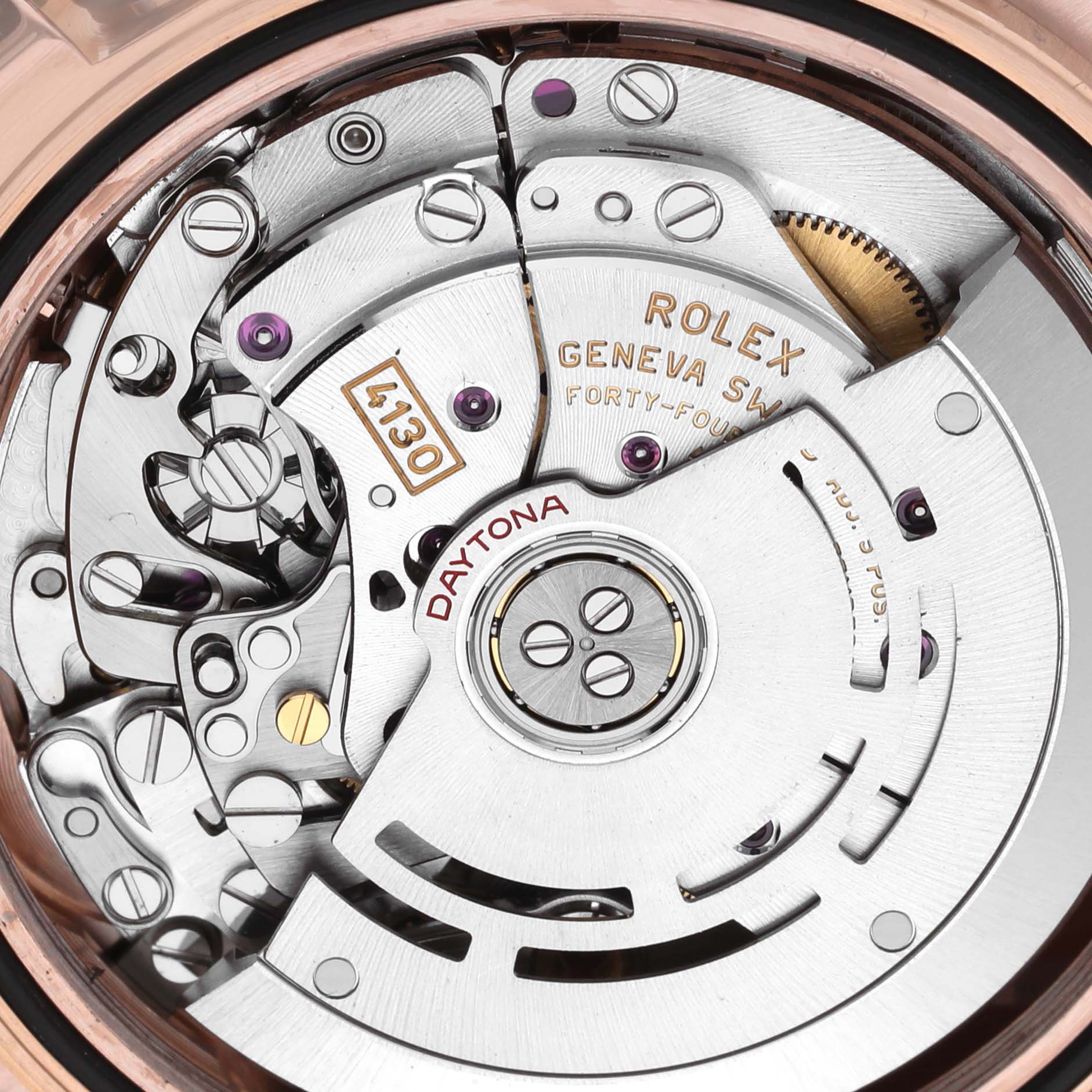 The image shows a detailed, close-up view of the movement mechanism of a Rolex Daytona 116515LN Men's Rose Gold Brown Dial 116515LN Men's Rose Gold Brown Dial watch.