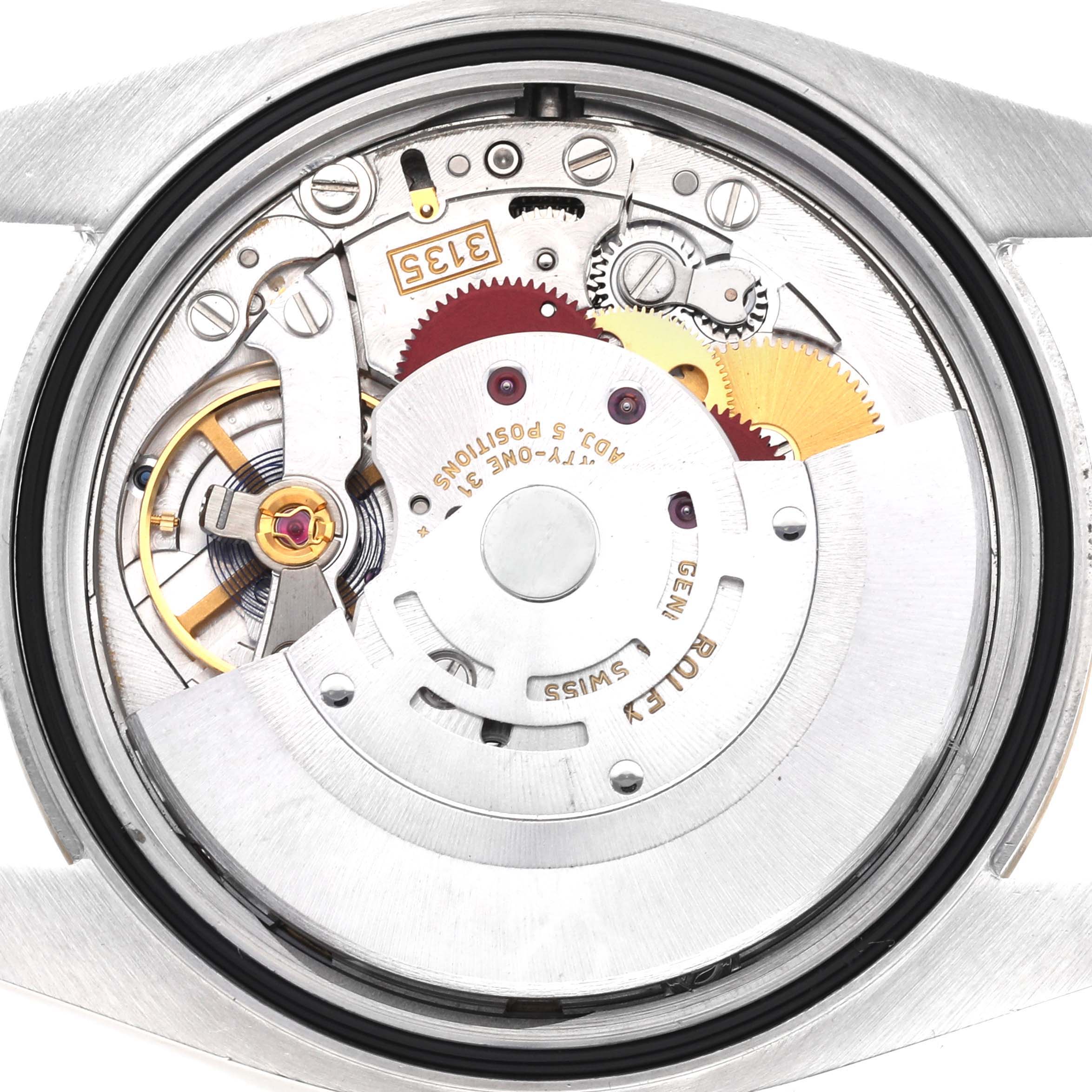 The image shows the movement of the Rolex Datejust 116233 Men
s Steel and Gold (two tone) Champagne Dial 116233 Men
s Steel and Gold (two tone) Champagne Dial 41, viewed from the back, highlighting gears and internal components.