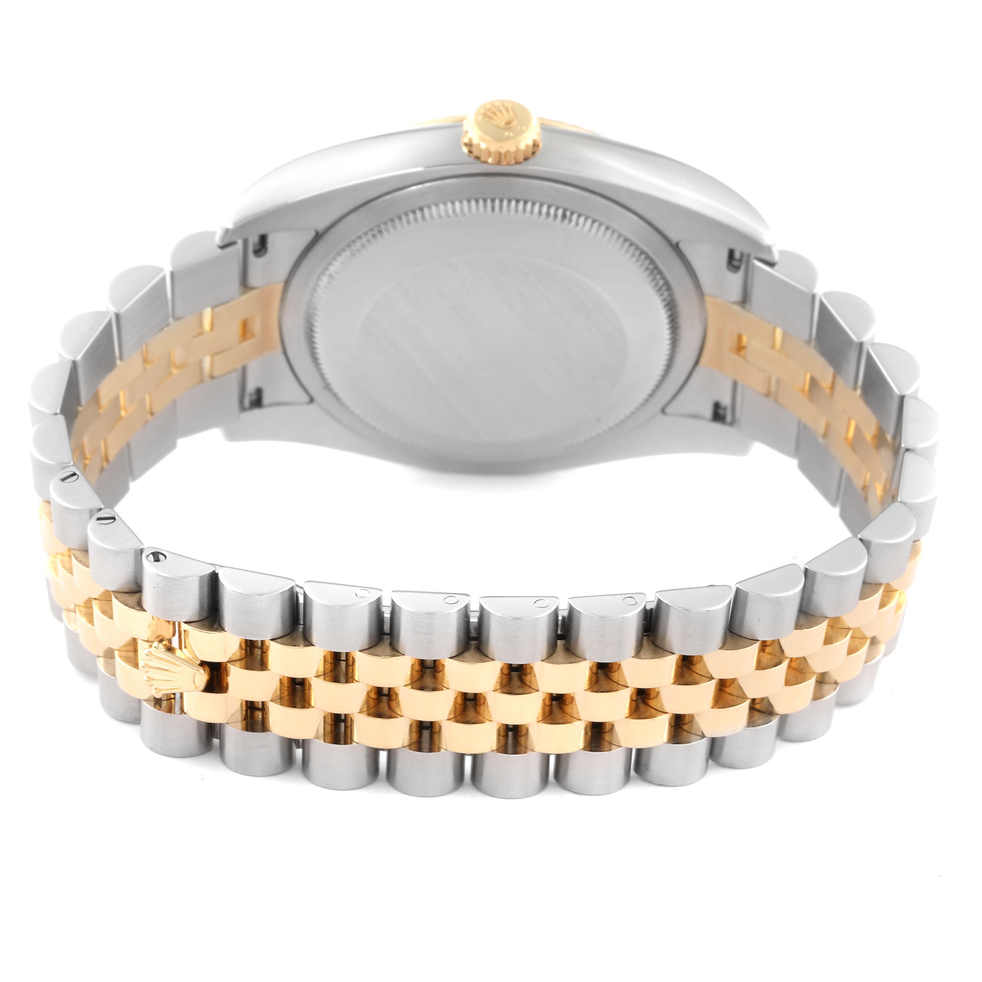 The image shows the back view of a Rolex Datejust 116233 Men
s Steel and Gold (two tone) Champagne Dial 116233 Men
s Steel and Gold (two tone) Champagne Dial 41 watch, highlighting its two-tone bracelet and case back.