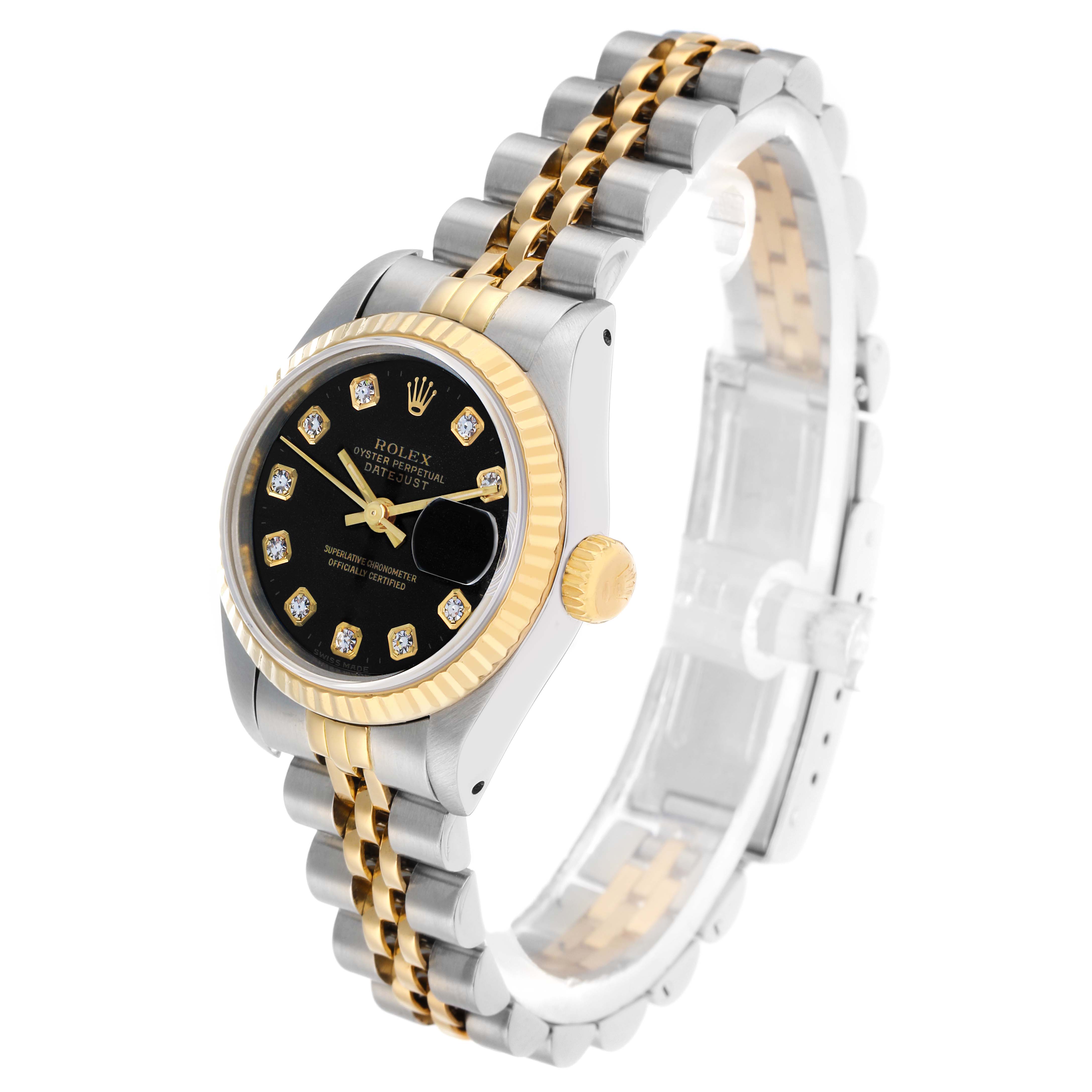 The Rolex Datejust 69173 Women
s Steel and Gold (two tone) Black Dial watch is shown at a three-quarter angle, highlighting the black dial, diamond markers, two-tone bracelet, and gold fluted bezel.